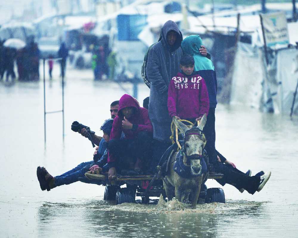 Winter storm rips through Gaza, exposing failure to deliver enough aid