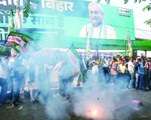 Firecrackers at NDA offices, silence in RJD