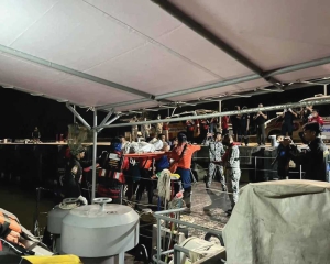 Malaysian rescuers searching for missing migrants