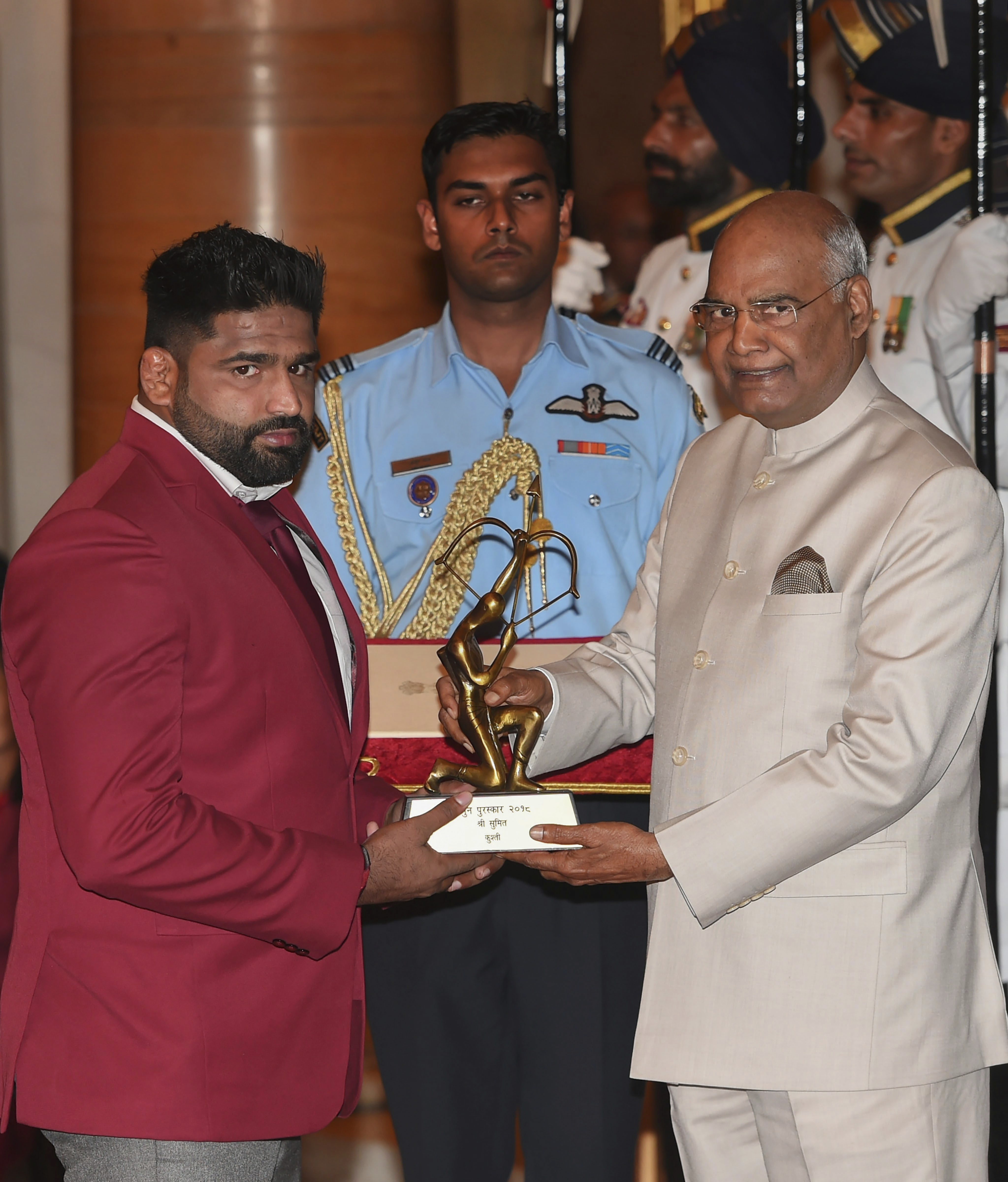 President Ram Nath Kovind presents Arjuna Award to weightlifter Sumit Malik at the National Sports and Adventure Award 2018 function at Rashtrapti Bhawan in New Delhi - PTI
