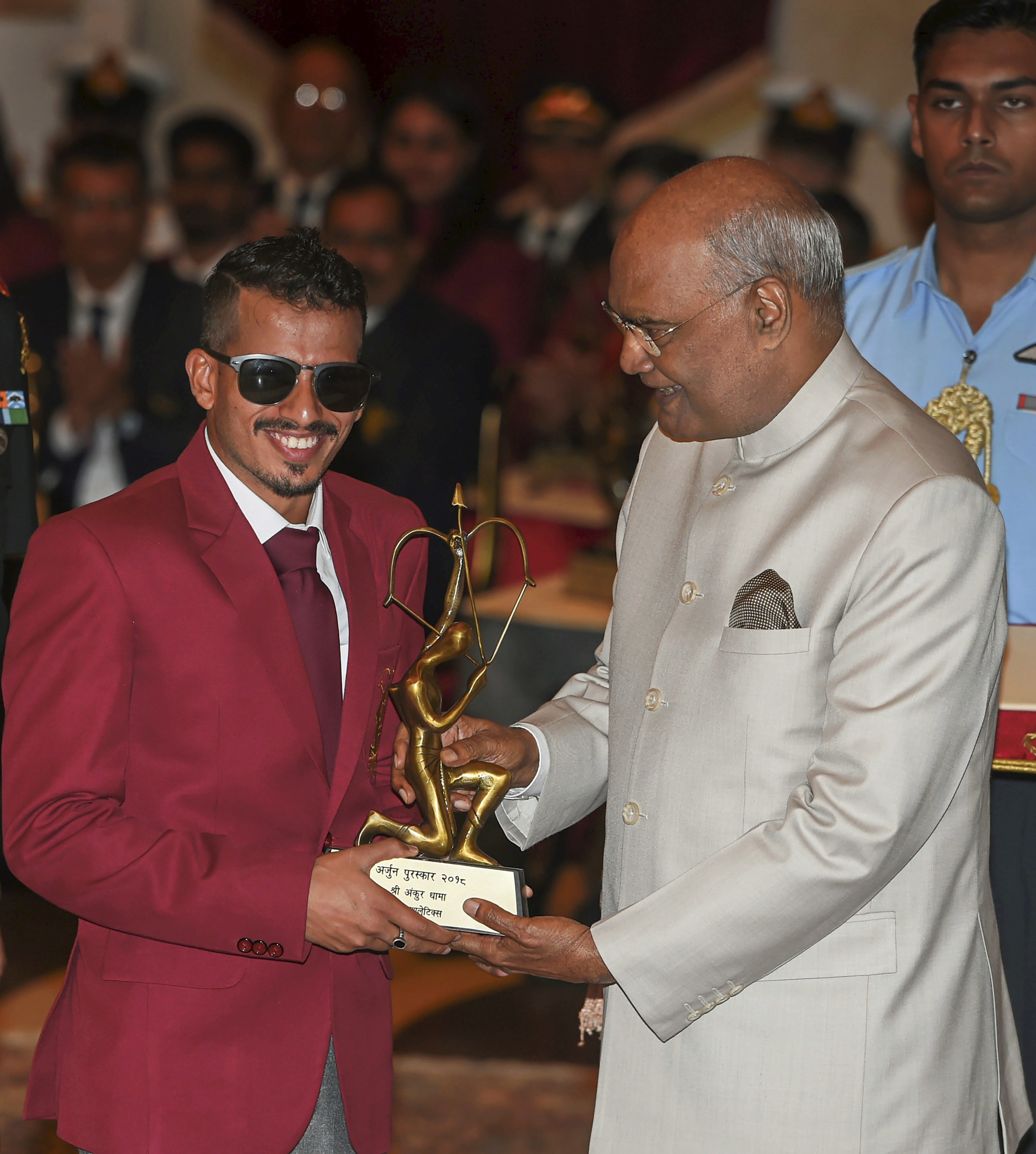 President Ram Nath Kovind presents Arjuna Award to para-athlete Ankur Dhama at the National Sports and Adventure Award 2018 function at Rashtrapti Bhawan in New Delhi - PTI
