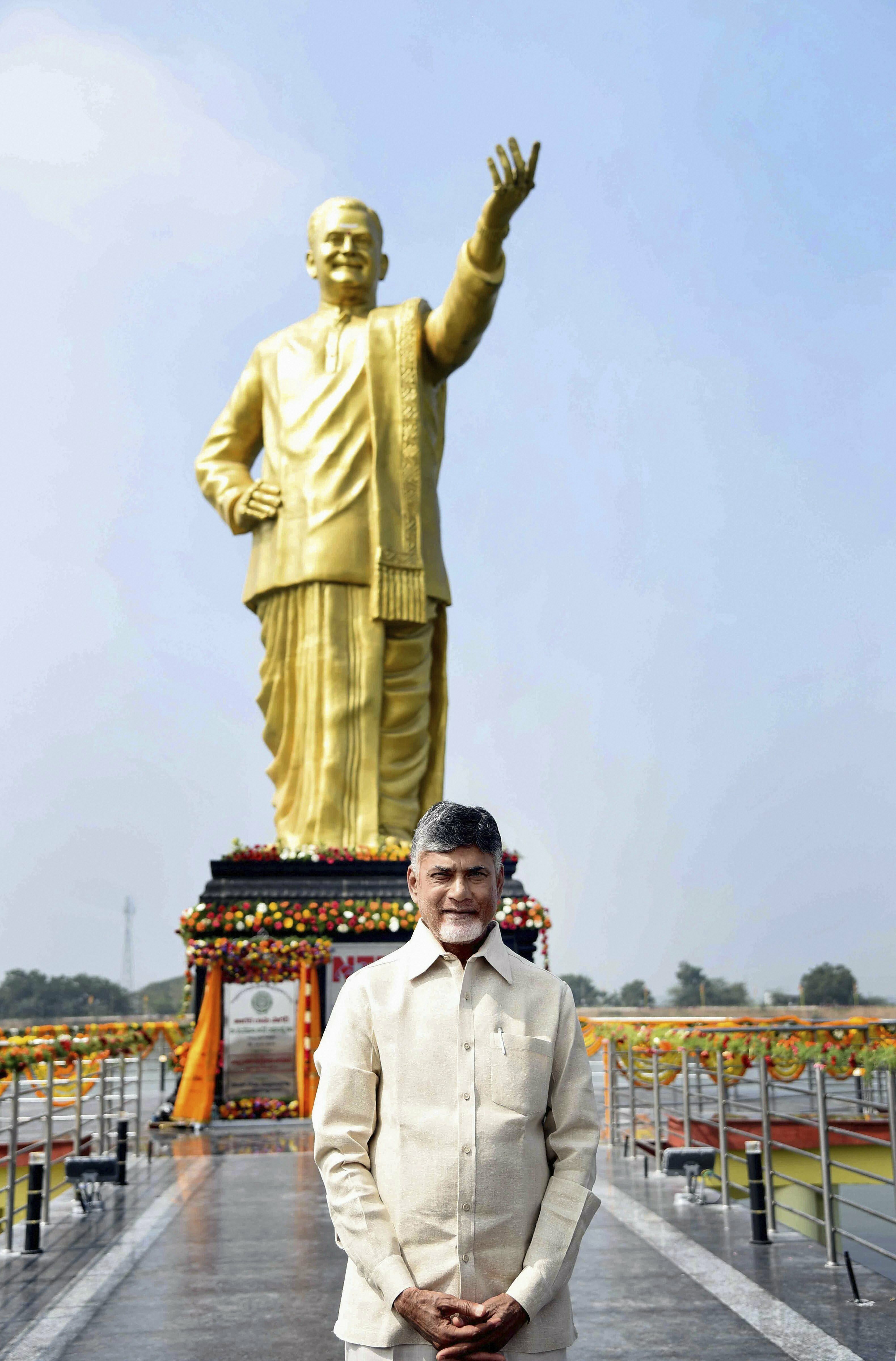 Andhra Pradesh Chief Minister N Chandrababu Naidu poses for photos at NTR Gardens after unveiling a statue of Vavilala Gopalakrishnaiah, in Guntur - PTI
