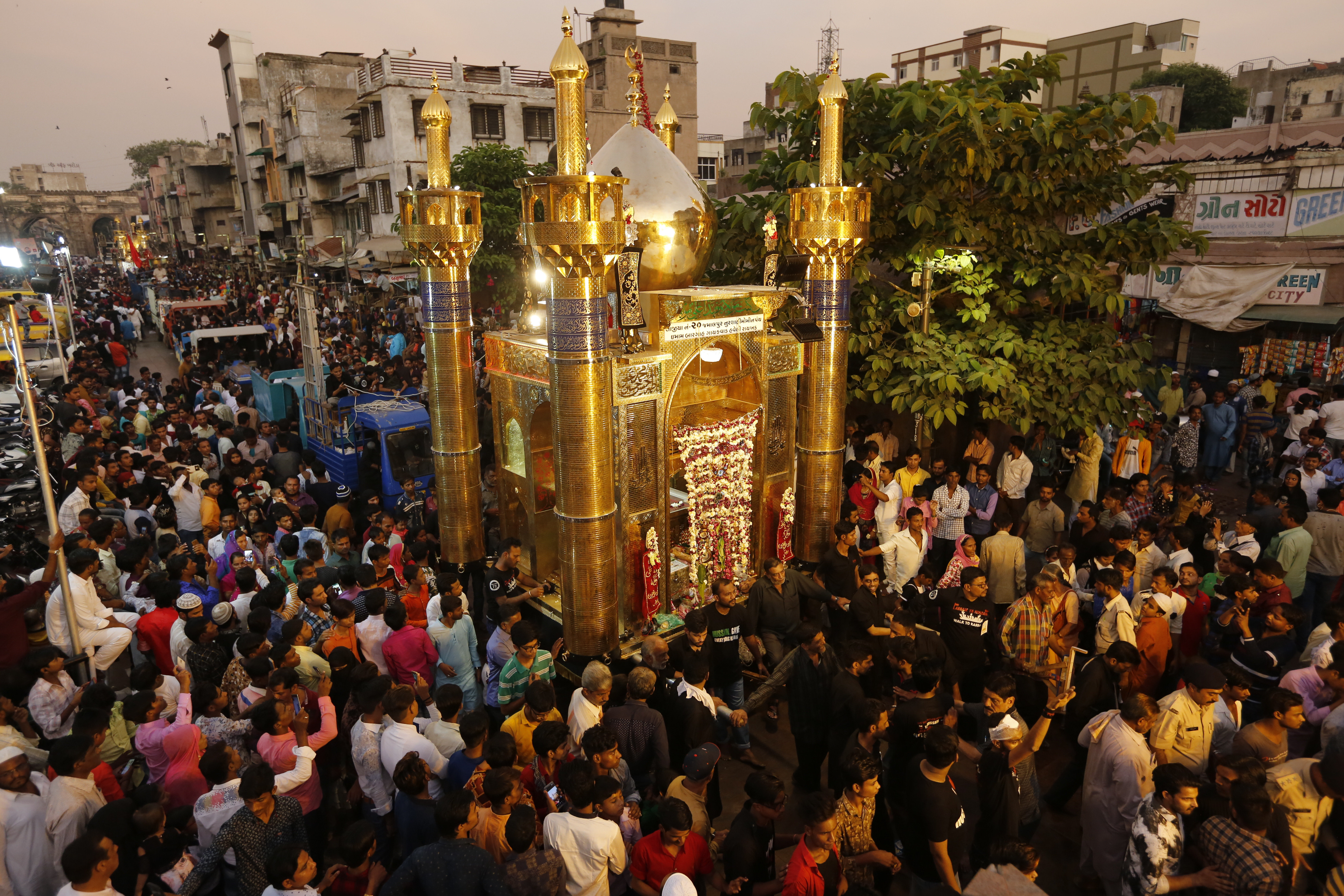 Indian Muslims participate in a Muharram procession in Ahmadabad - AP