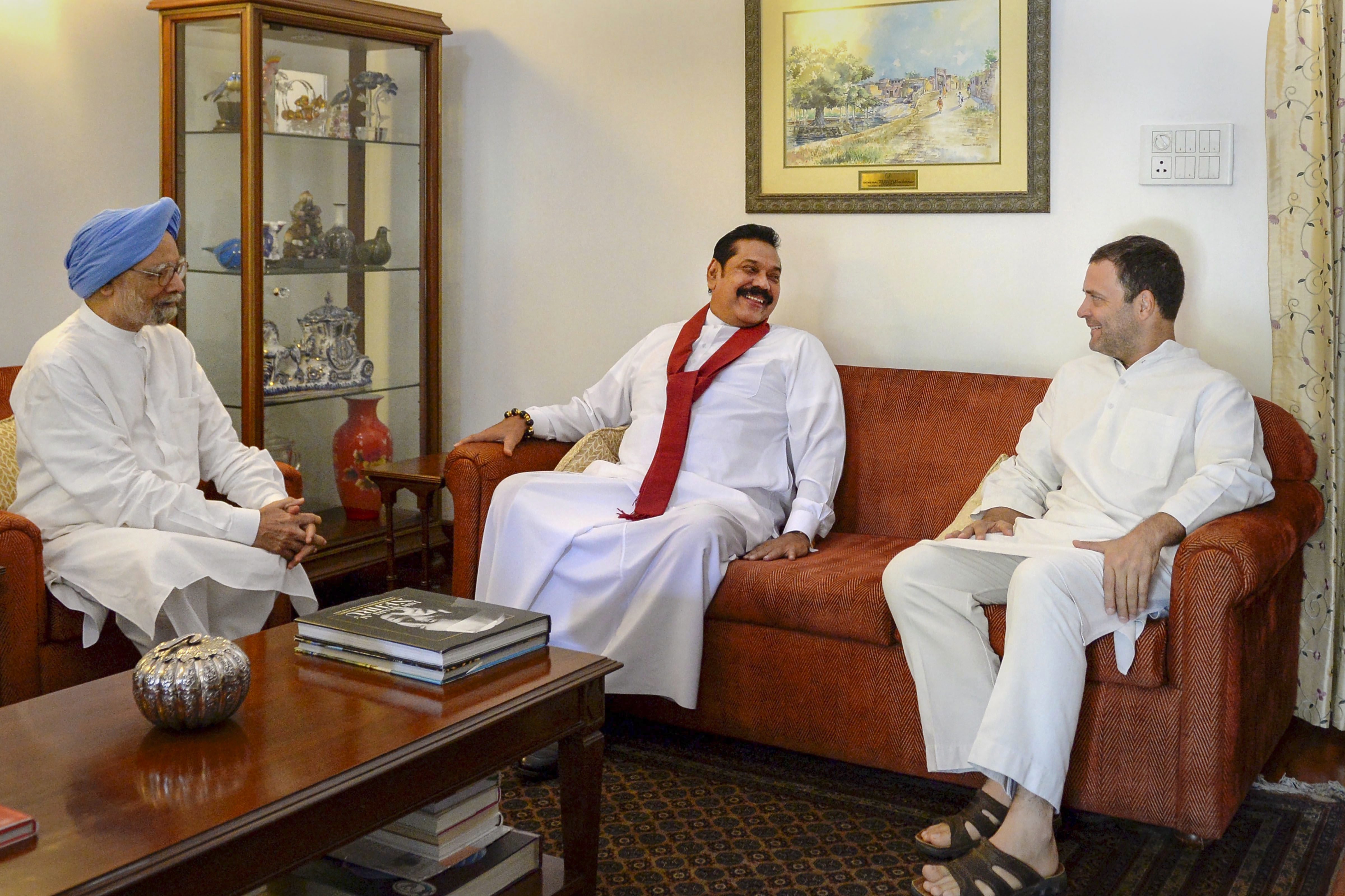 Congress President Rahul Gandhi, former prime minister Manmohan Singh and Sri Lankan former President Mahinda Rajapaksa, in New Delhi - PTI