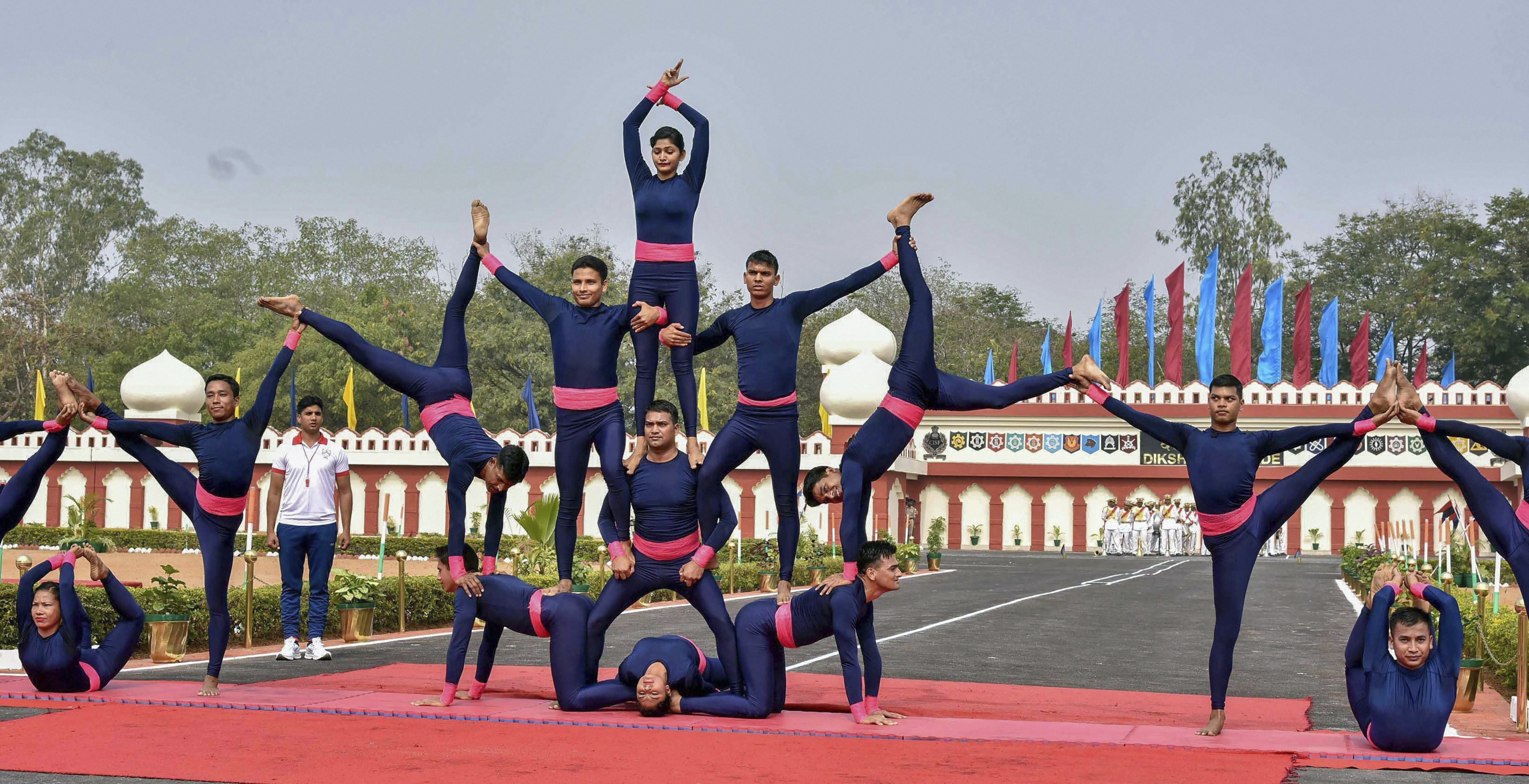 CISF cadets perform yoga during the passing-out parade, in Hyderabad - PTI
