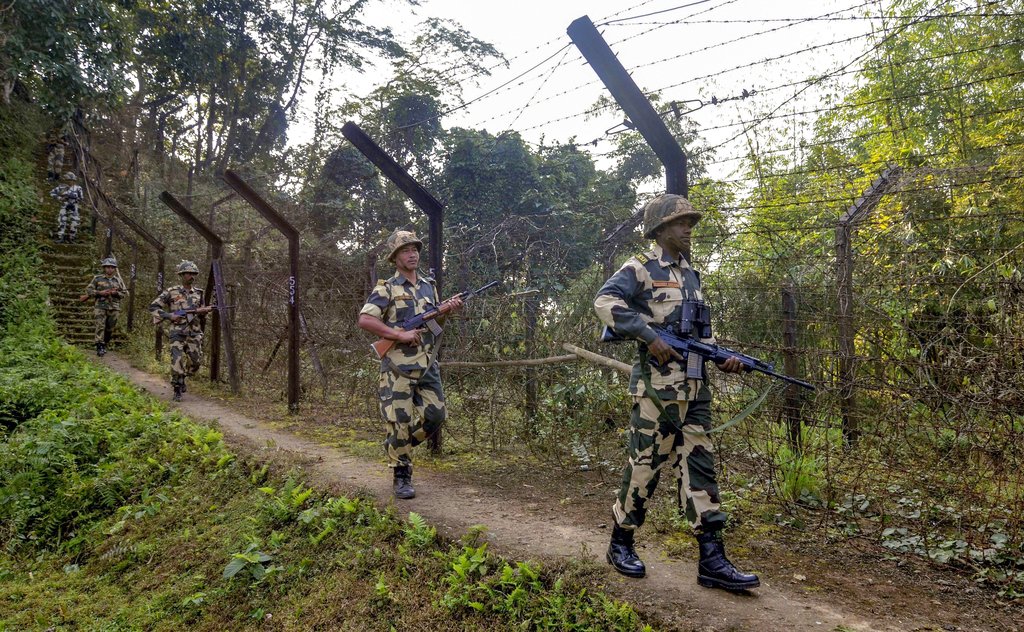 Border Security Force (BSF) 166th Battalion personnel deployed across Indo-Bangla international border in Tripura to check infiltration or ex-filtration ahead of the general election in neighboring Bangladesh scheduled to be held tomorrow, in Dharmanagar - PTI