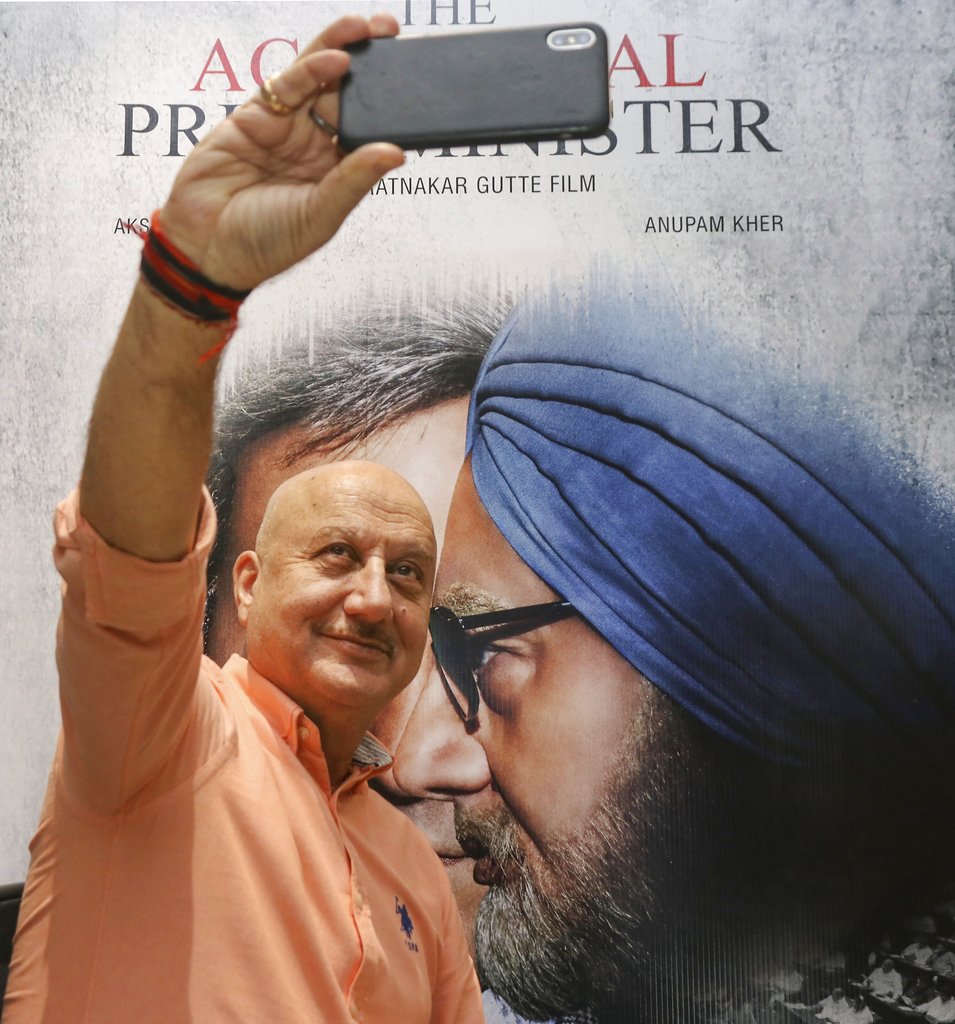Bollywood actor Anupam Kher takes a selfie during the promotion of his upcoming biographical film 'The Accidental Prime Minister', in Mumbai - PTI
