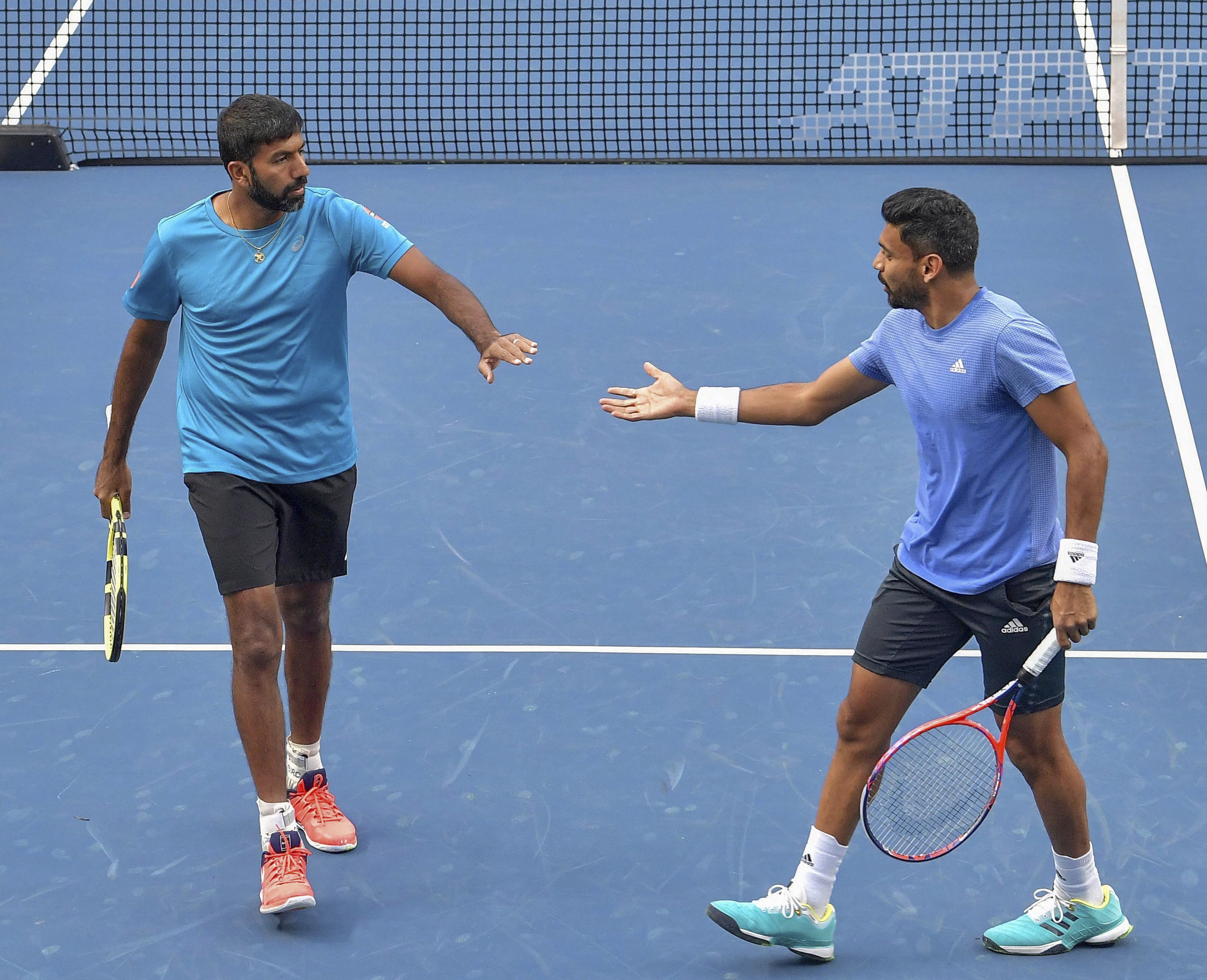 Tennis players Rohan Bopanna and Divij Sharan during a match against Simone Bolelli and Ivan Dodig at Tata Open Maharashtra 2019 of the ATP 250 tournament, in Pune - PTI