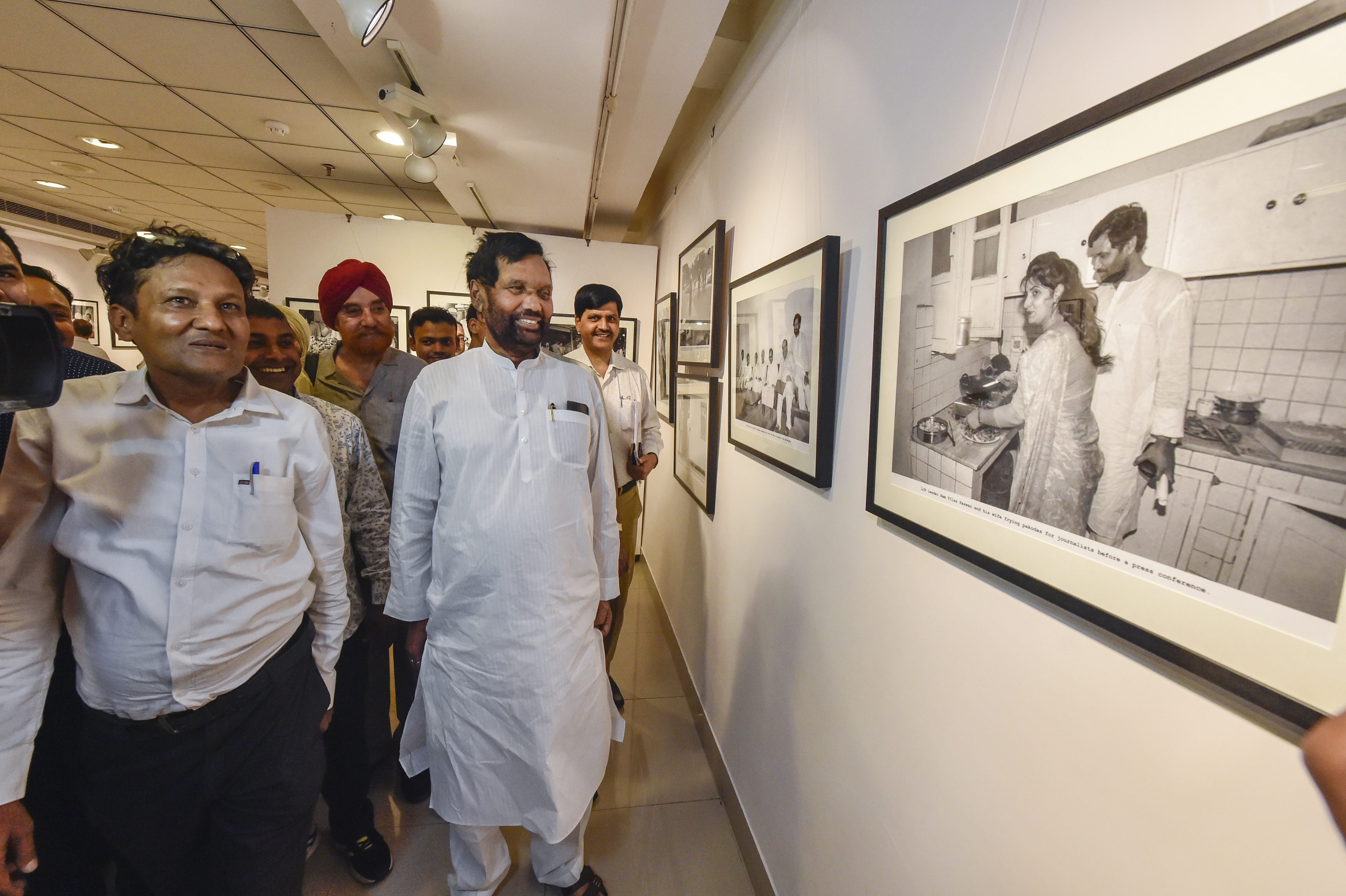 Lok Janshakti Party (LJP) leader Ram Vilas Paswan visits the photo exhibition '200 & One' by Photo journalist Praveen Jain, in New Delhi - PTI
