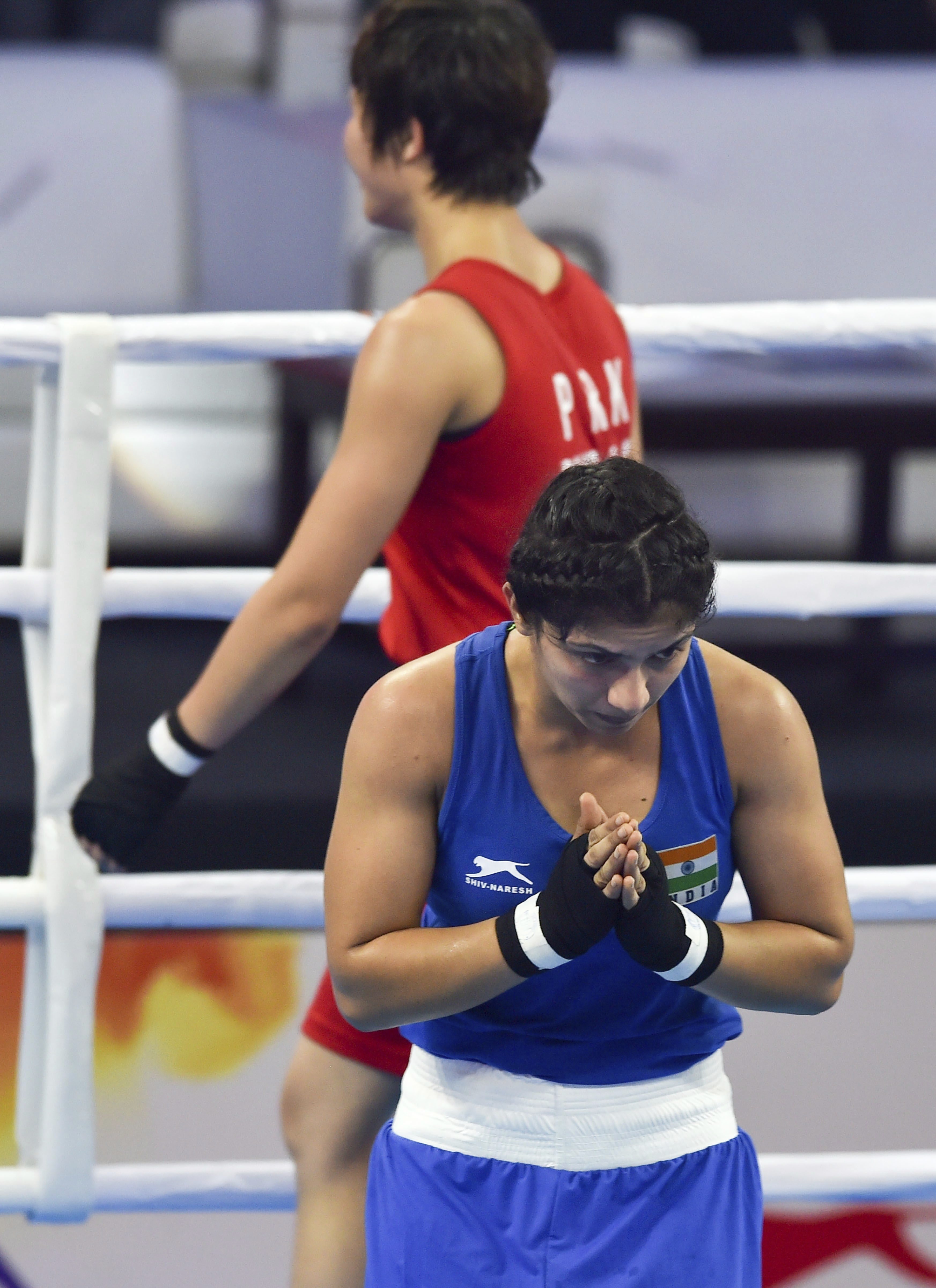 India's Pinki Rani gestures after losing the quarterfinal match to North Korea's Mi Choi Pang (in Red) of women's Flyweight 51 kg category at AIBA Women's World Boxing Championships, in New Delhi - PTI