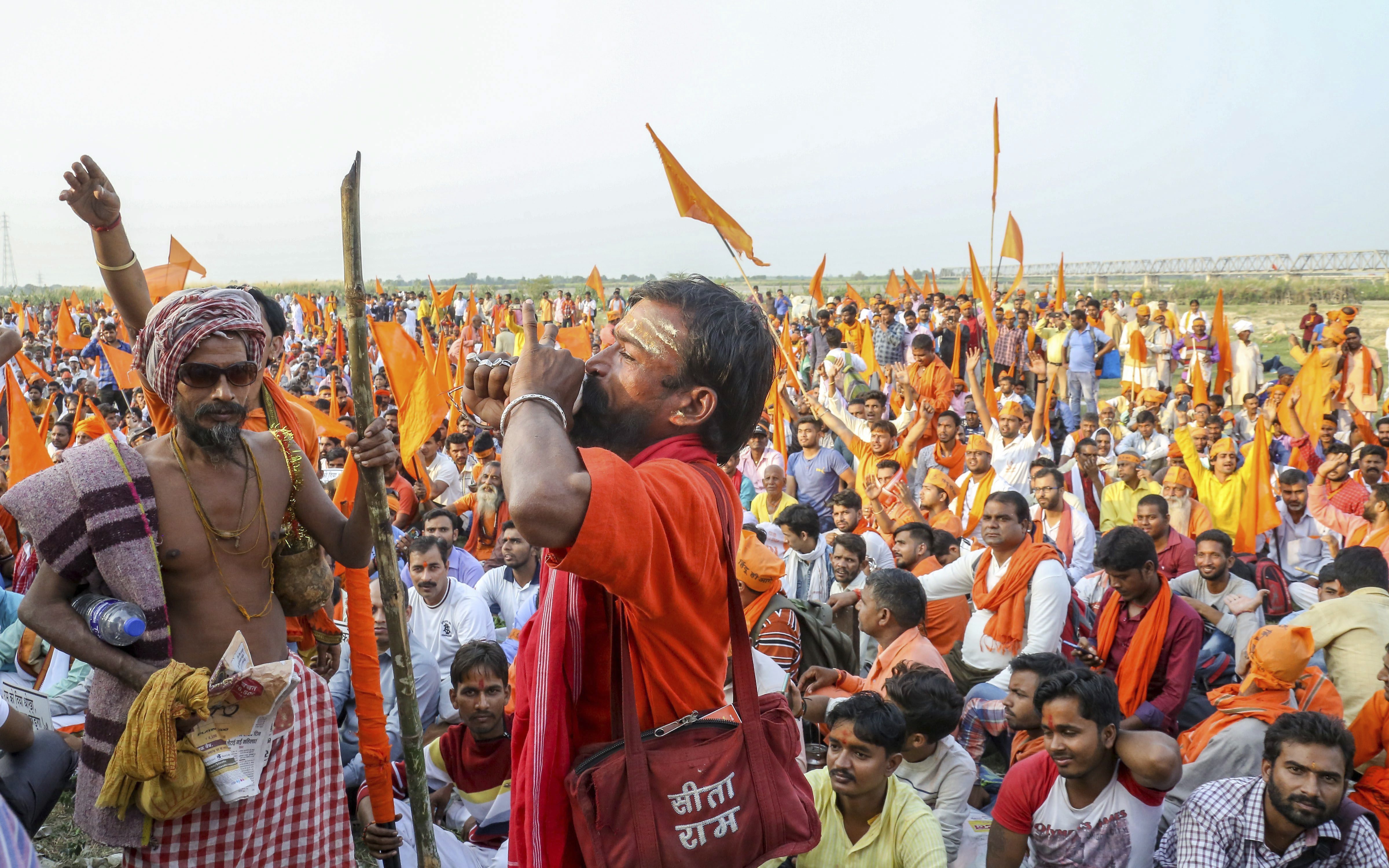Supporters of Antarrashtria Hindu Parishad president Pravin Togadia at a rally near the 'samadhi' of Ram Chandra Paramhans, in Ayodhya - PTI