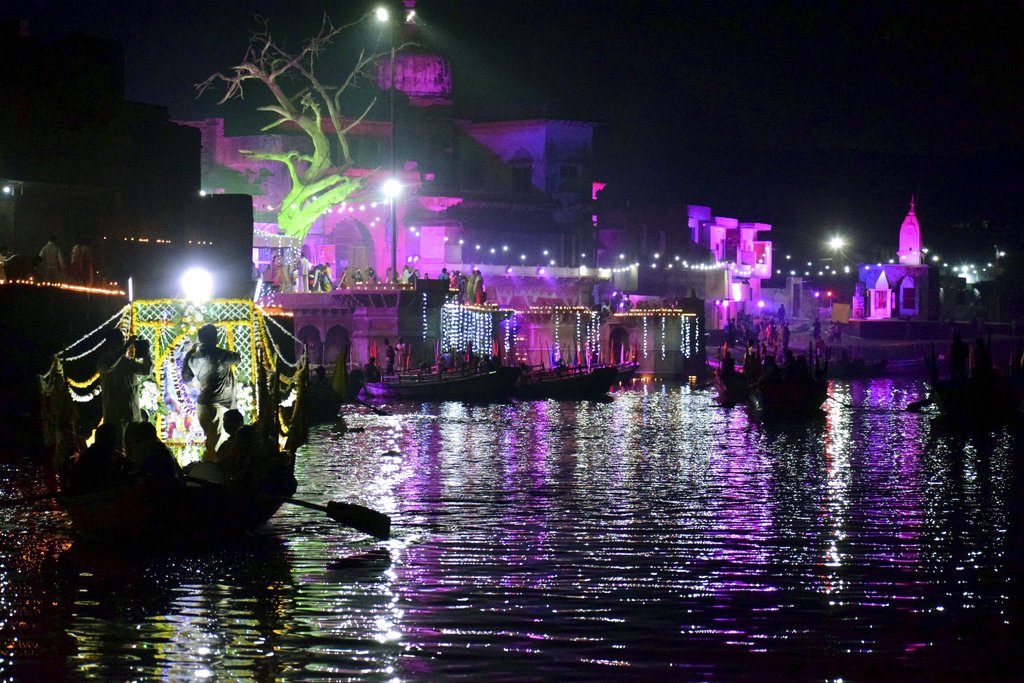 Devotees celebrate Kartik Purnima in Mathura by lighting lamps (diyas) on the banks of Yamuna River - PTI