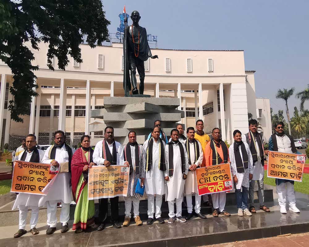 BJP MLAs protest near the statue of Mahatma Gandhi demanding justice in Jajpur peon death case, in Bhubaneswar - PTI