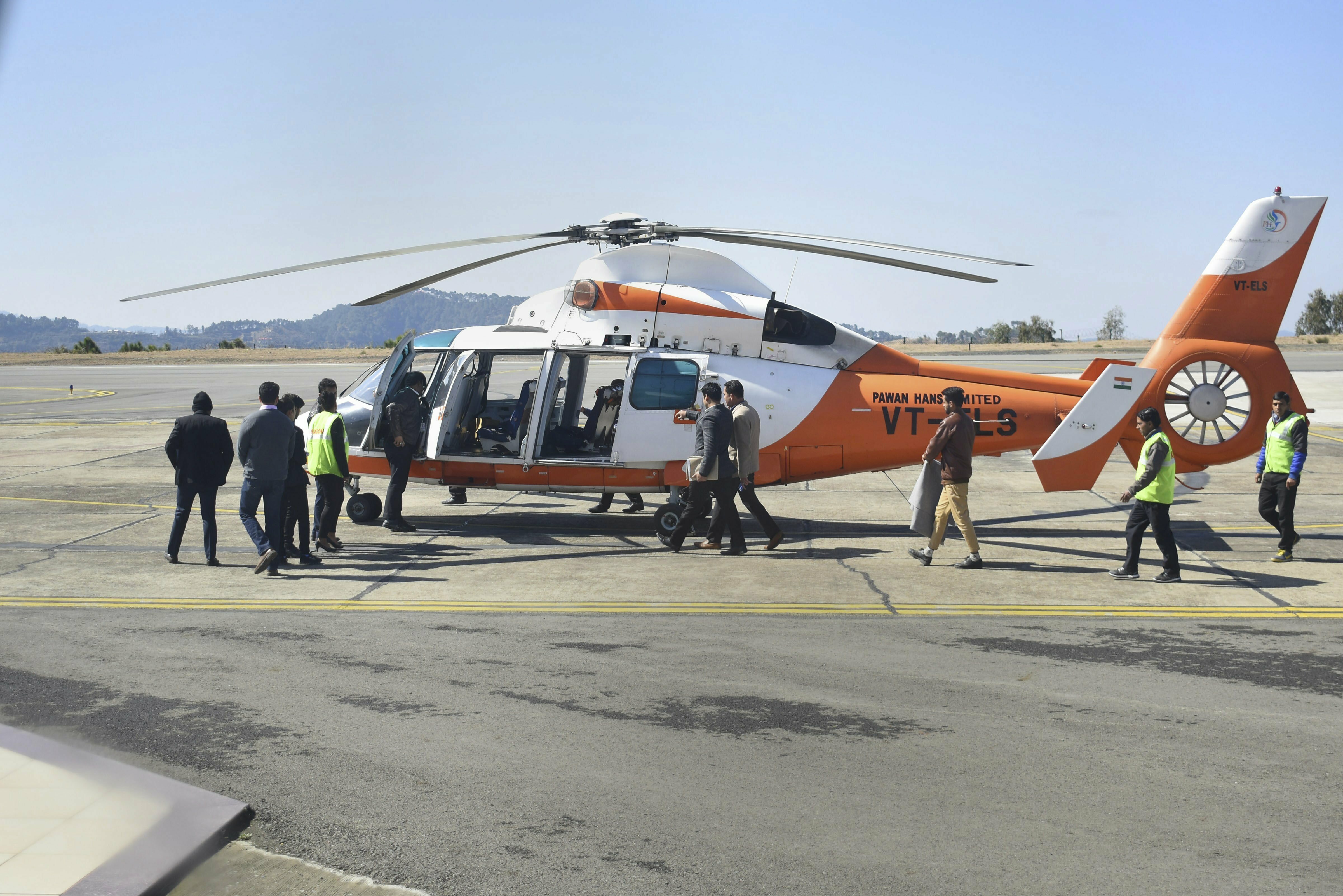 A helicopter prepares for the first interstate helicopter service between Shimla-Chandigarh under 'Udaan-2' scheme, at the airport in Shimla - PTI
