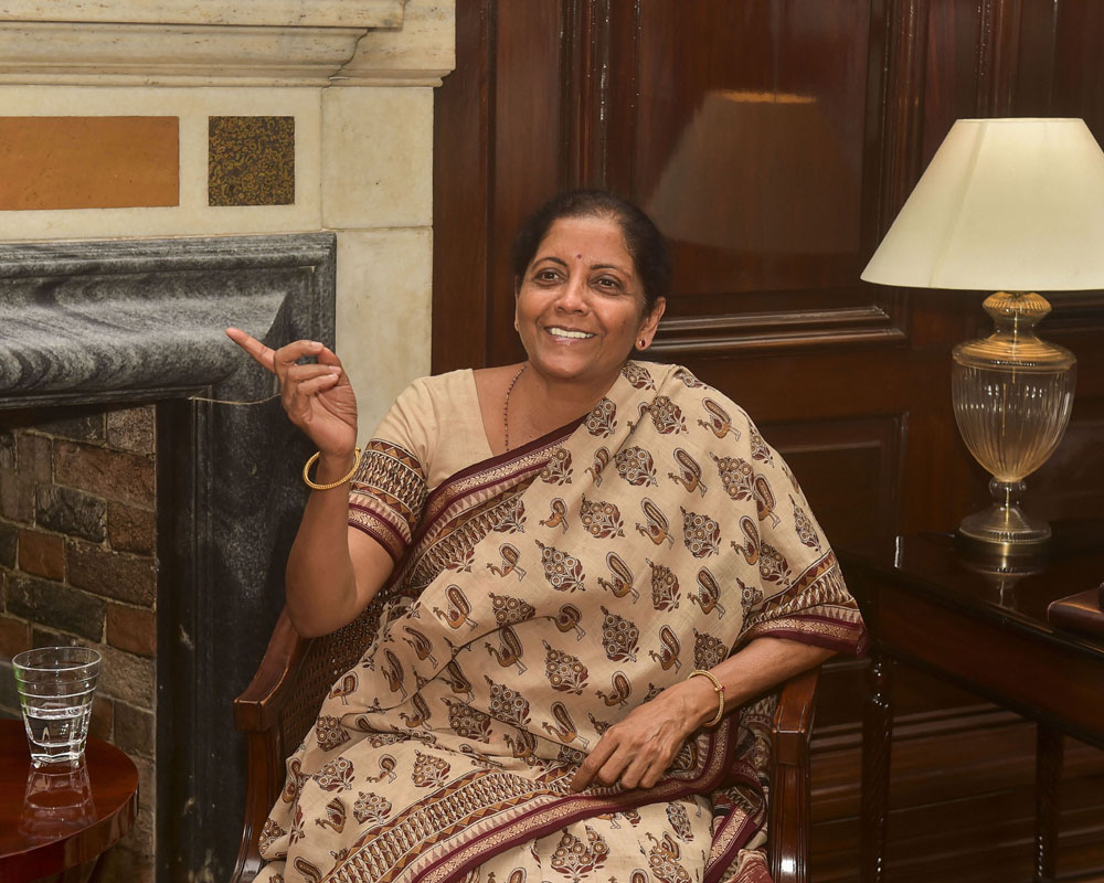Newly appointed Finance Minister Nirmala Sitharaman takes charge at South Block, in New Delhi - PTI