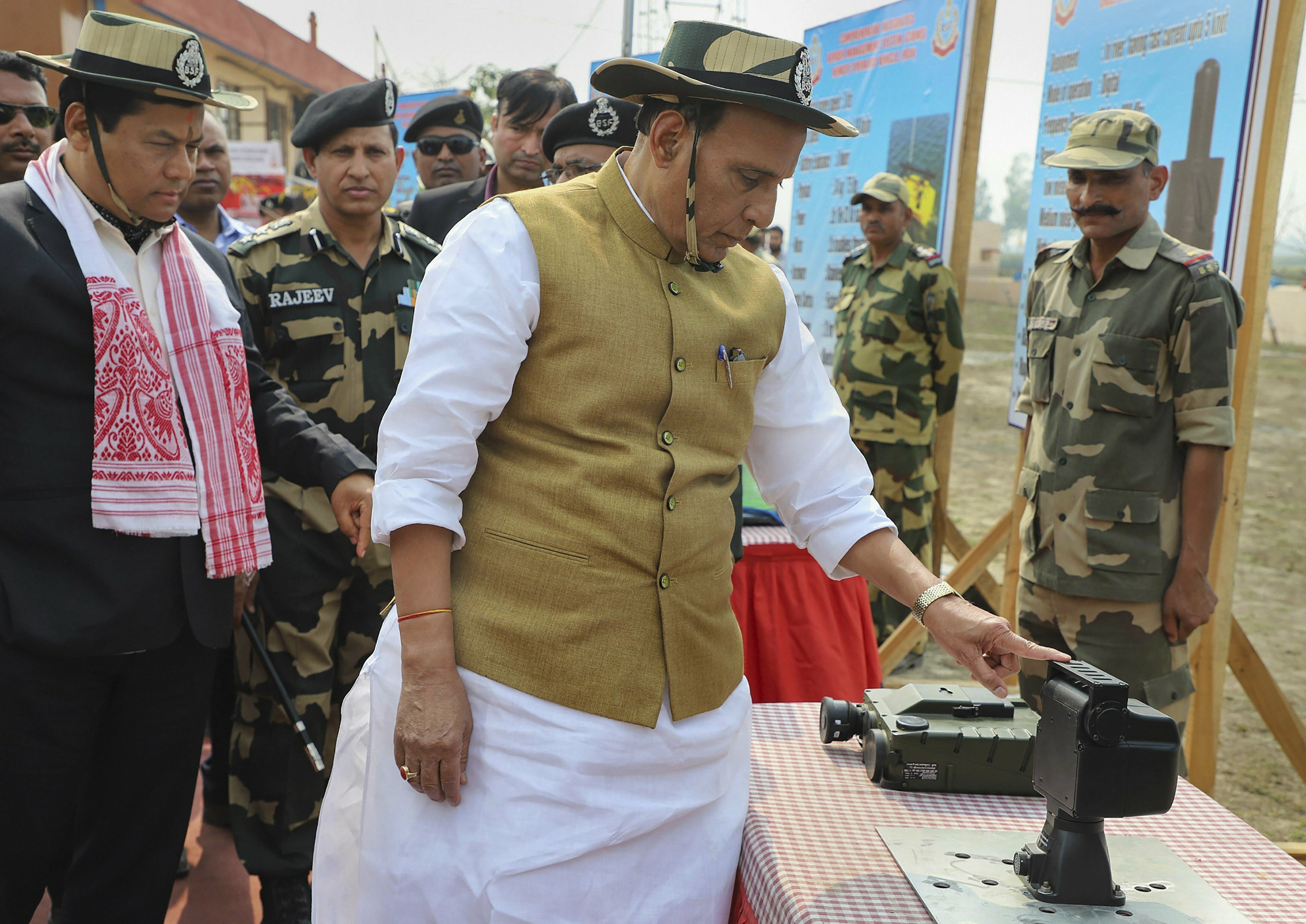 Union Home Minister Rajnath Singh during the inauguration of the Comprehensive Integrated Border Management System (CIBMS) project at Indo-Bangladesh border in Dhubri district of Assam - PTI