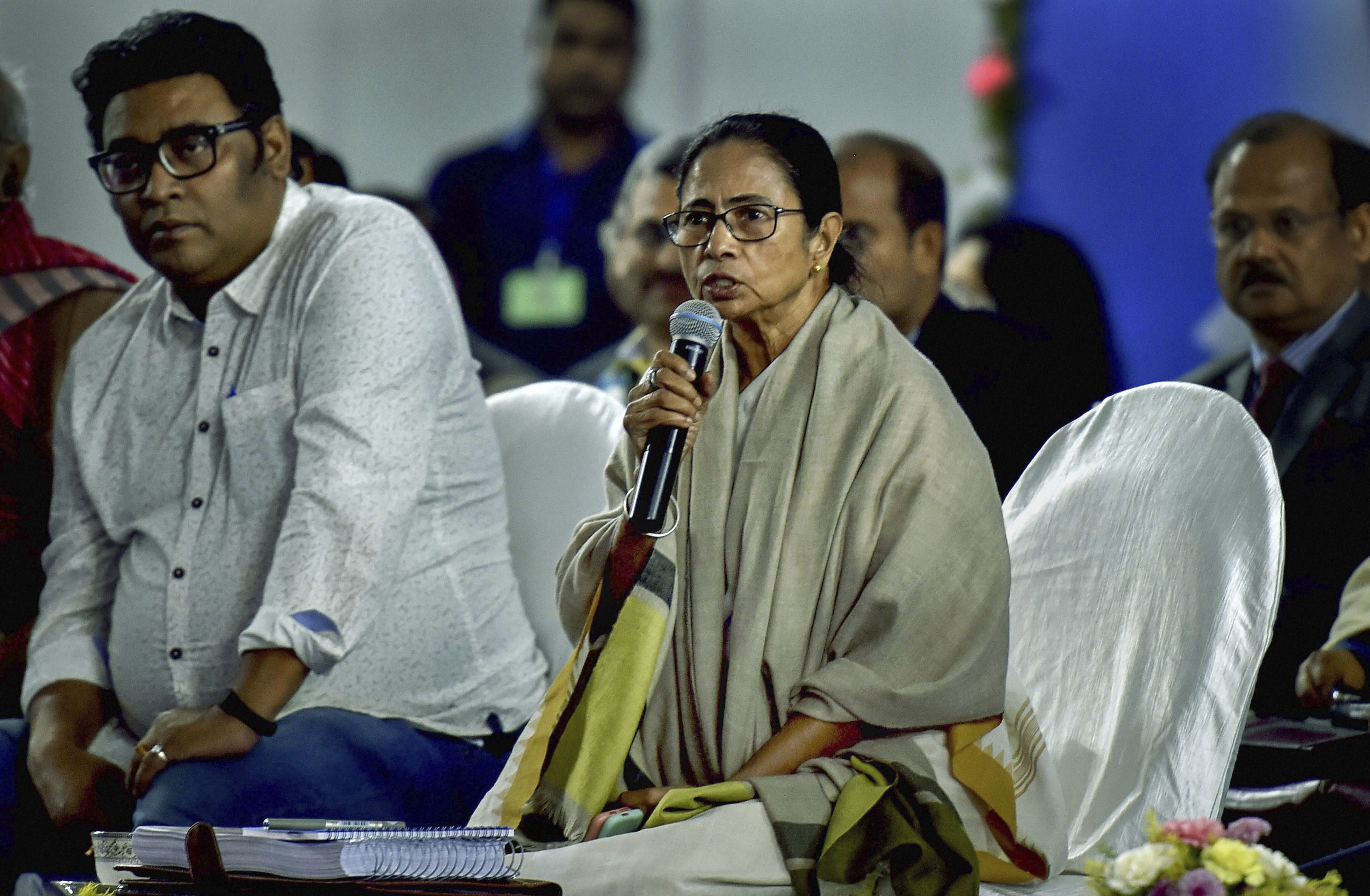 West Bengal Chief Minister Mamata Banerjee speaks during an adminstrative review meeting at Namkhana in South 24 Parganas district of West Bengal - PTI