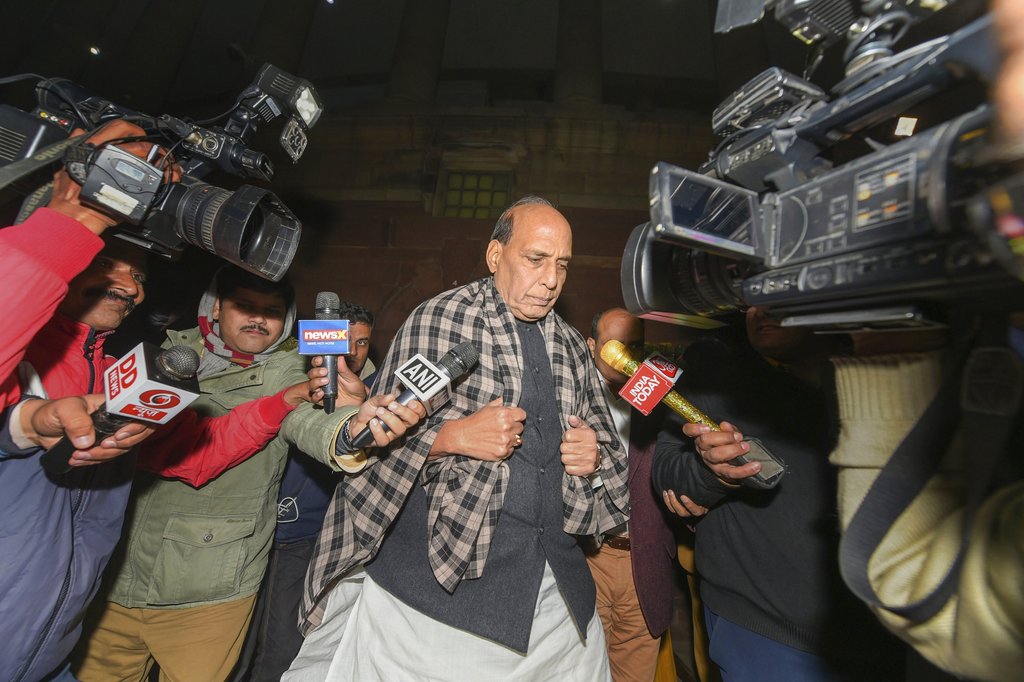 Union Home Minister Rajnath Singh comes out of the Parliament House after Triple Talaq Bill was passed in Lok Sabha during the Winter Session, in New Delhi - AP