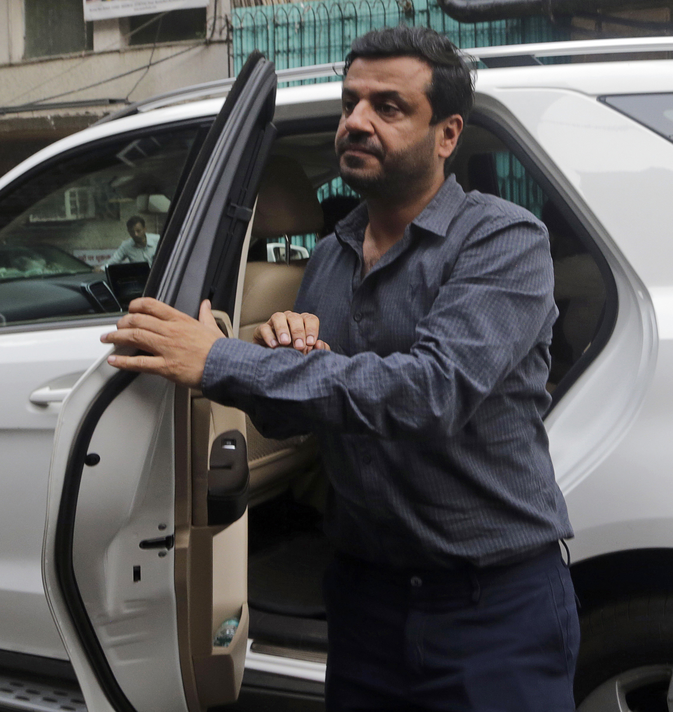 Bollywood film Director Vikas Bahl arrives at a court in Mumbai, India - AP