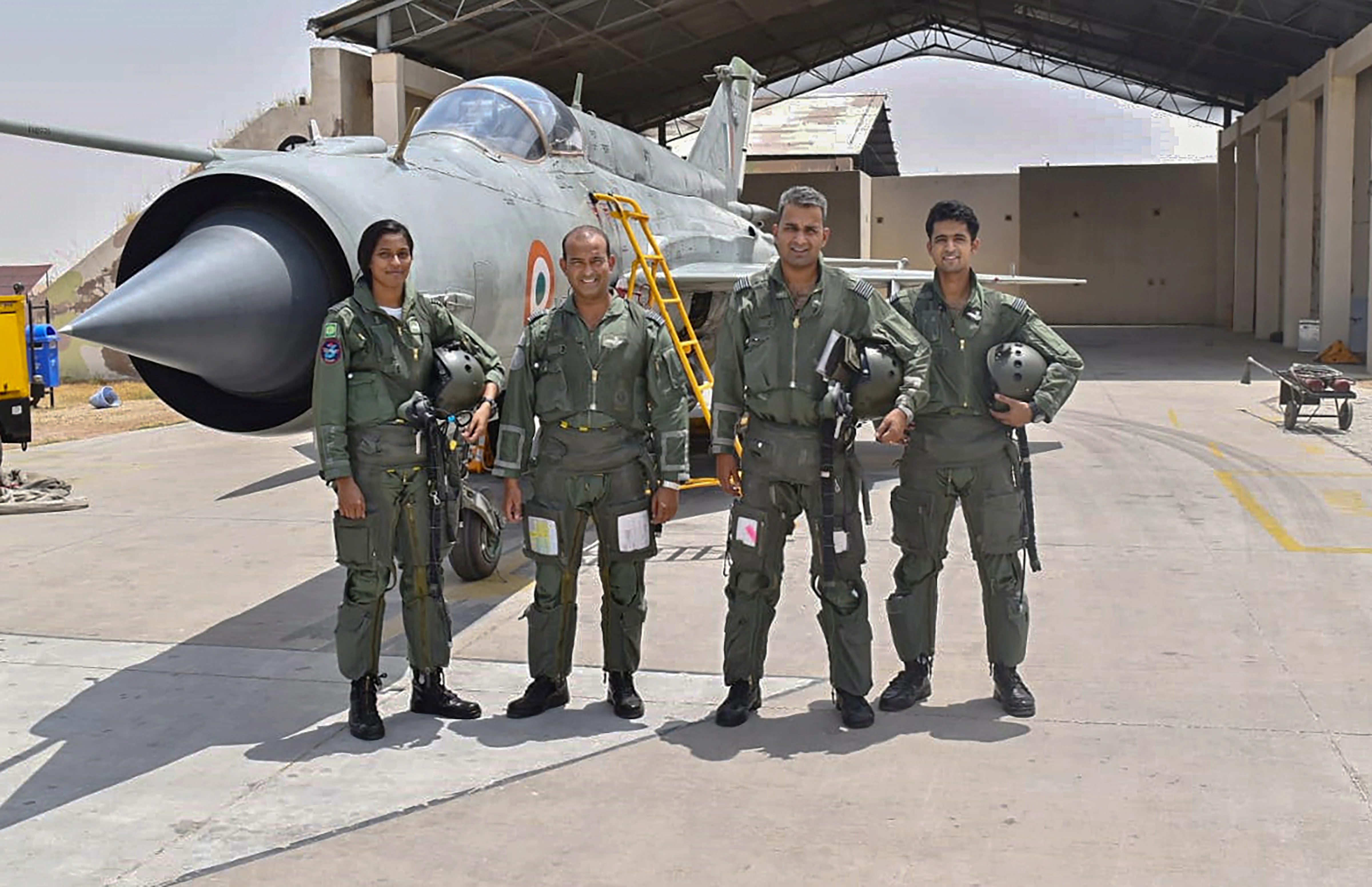 Flt Lt Bhawana Kanth (L) poses for photos as she completes Day operational syllabus on MiG-21 Bison aircraft - PTI