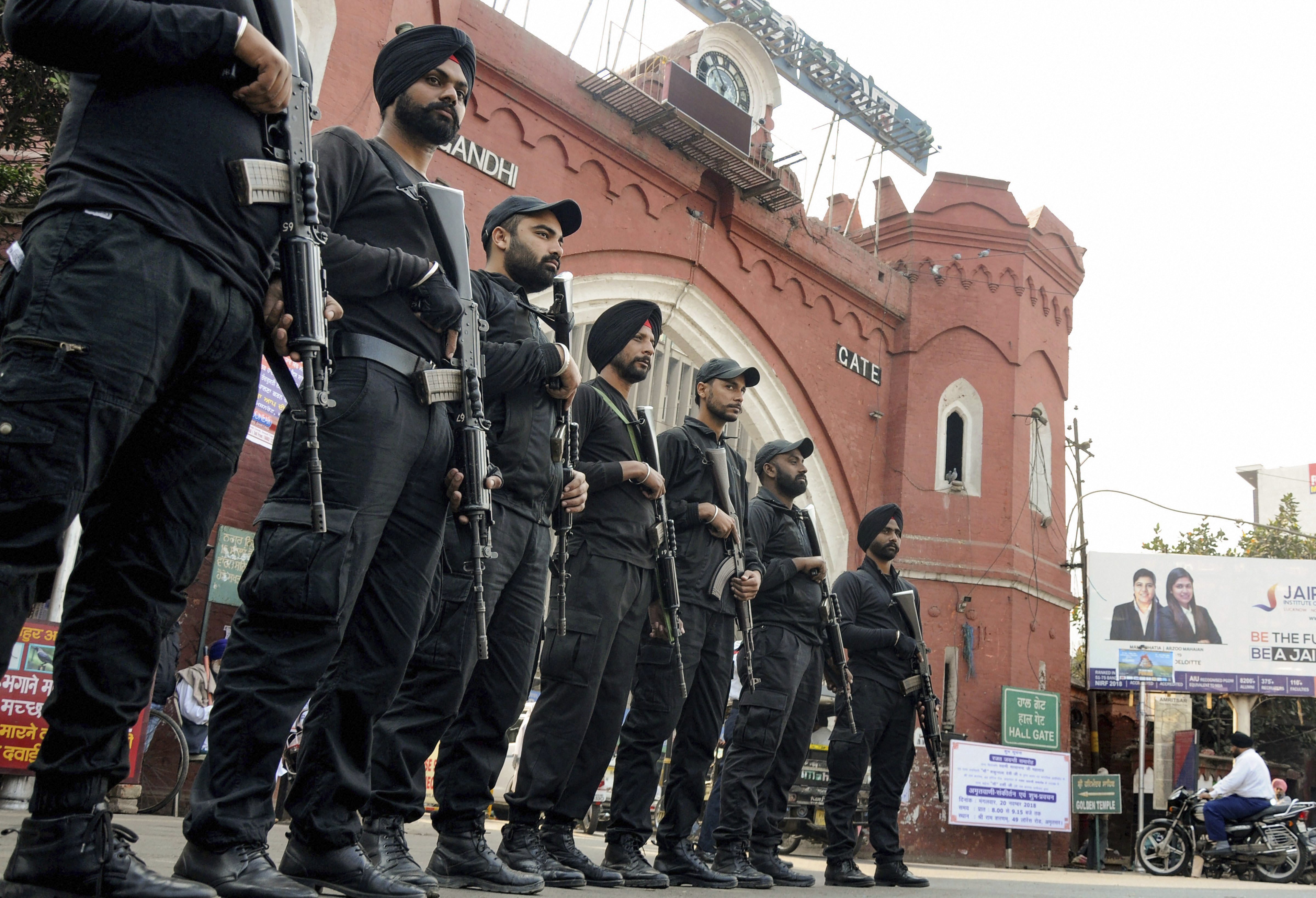 Punjab-police-SWAT-team stand guard at Hall Gate of Golden Temple, in Amritsar - PTI