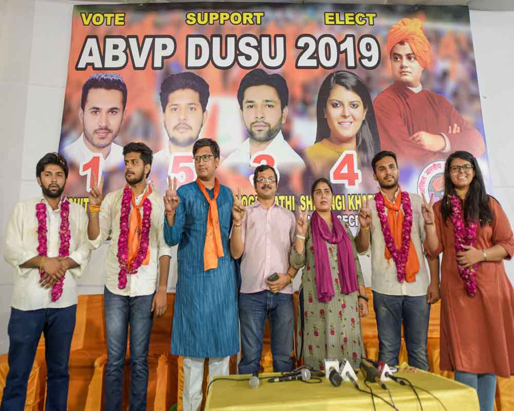 Akhil Bharatiya Vidyarthi Parishad (ABVP) candidates Akshit Dahiya (L), Pradeep Tanwar (2nd L), Shivangi Kharwal (R) duriga  press conference after their victory in the Delhi University Students' Union (DUSU) elections 2019, in New Delhi - PTI