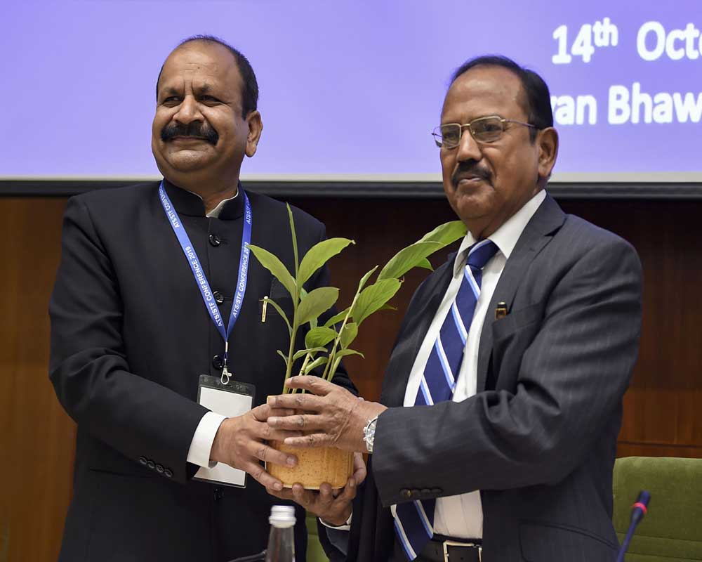 National Security Advisor Ajit Doval being greeted by NIA Director General Yogesh Chander Modi during the National Investigation Agency(NIA)'s national conference of Chiefs of Anti-Terrorism Squad/ Special Task Force, in New Delhi - PTI