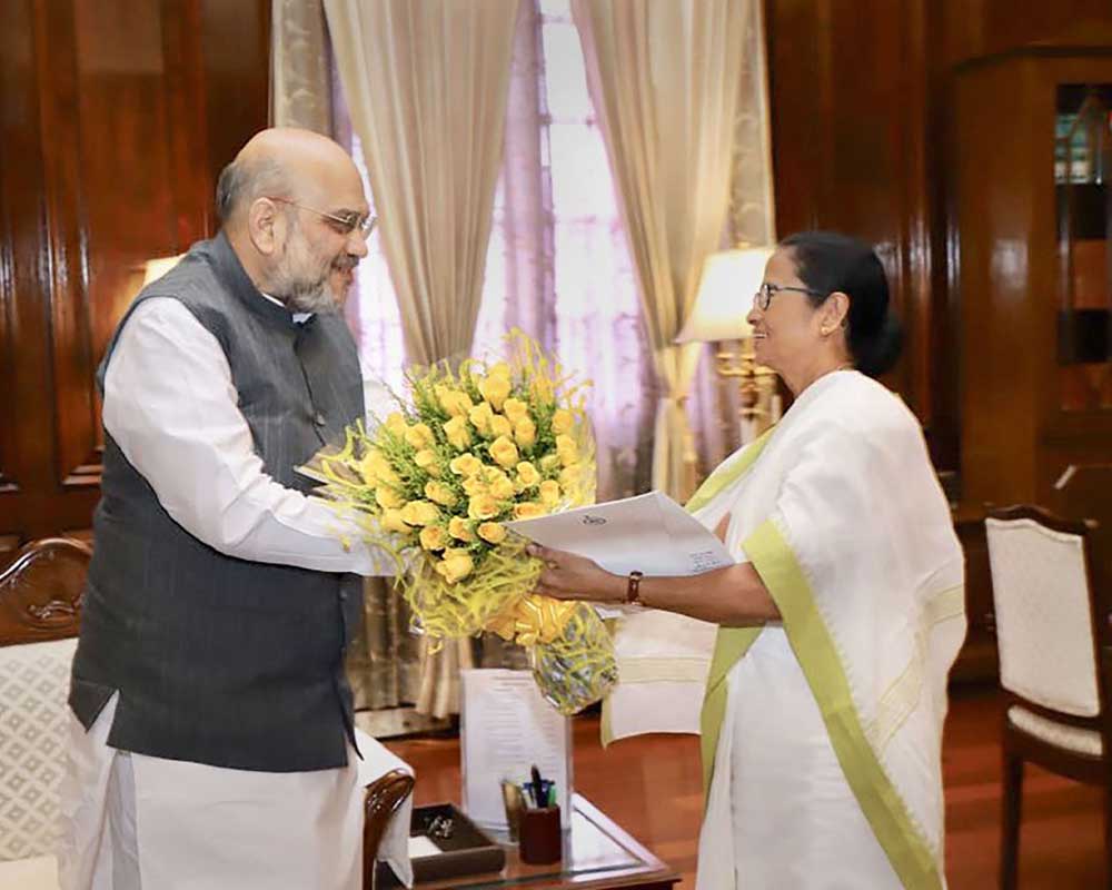 West Bengal Chief Minister Mamata Banerjee meets Home Minister Amit Shah at his office, at North Block in New Delhi - PTI