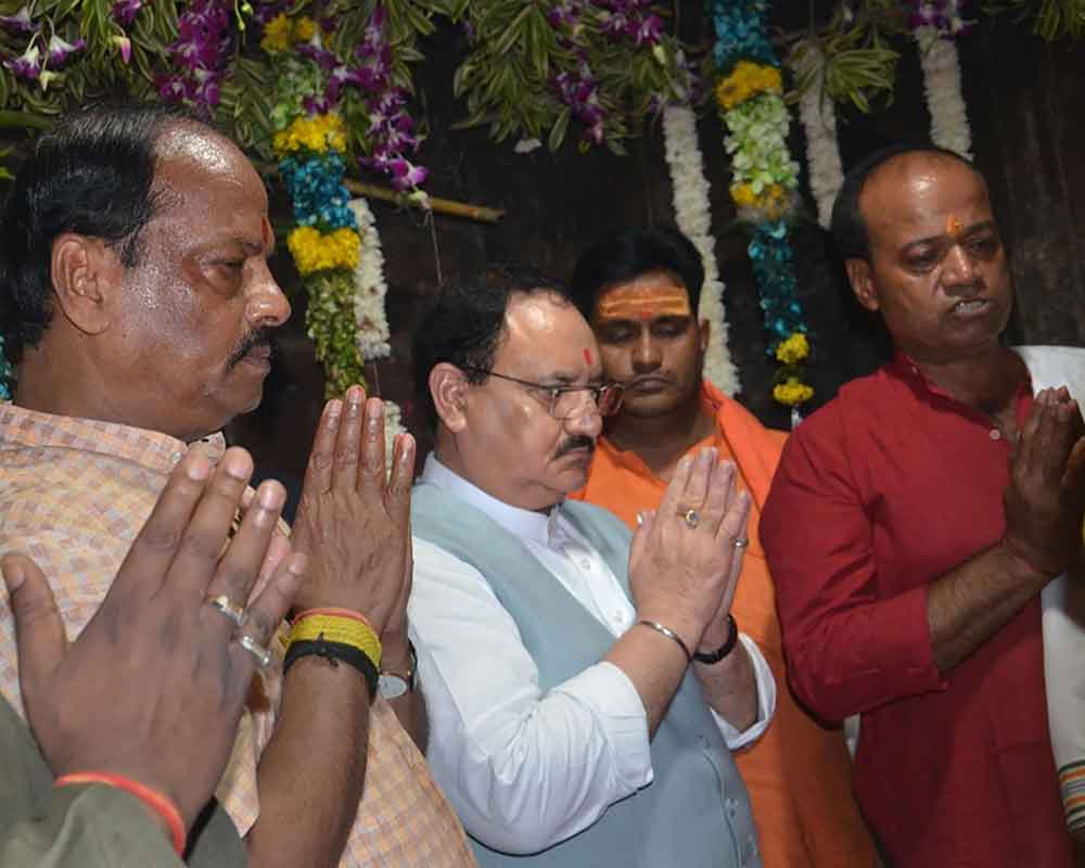 BJP President JP Nadda and Jharkhand Chief Minister Raghubar Das offer prayers at Rajarappa Temple in Ramgarh district - PTI