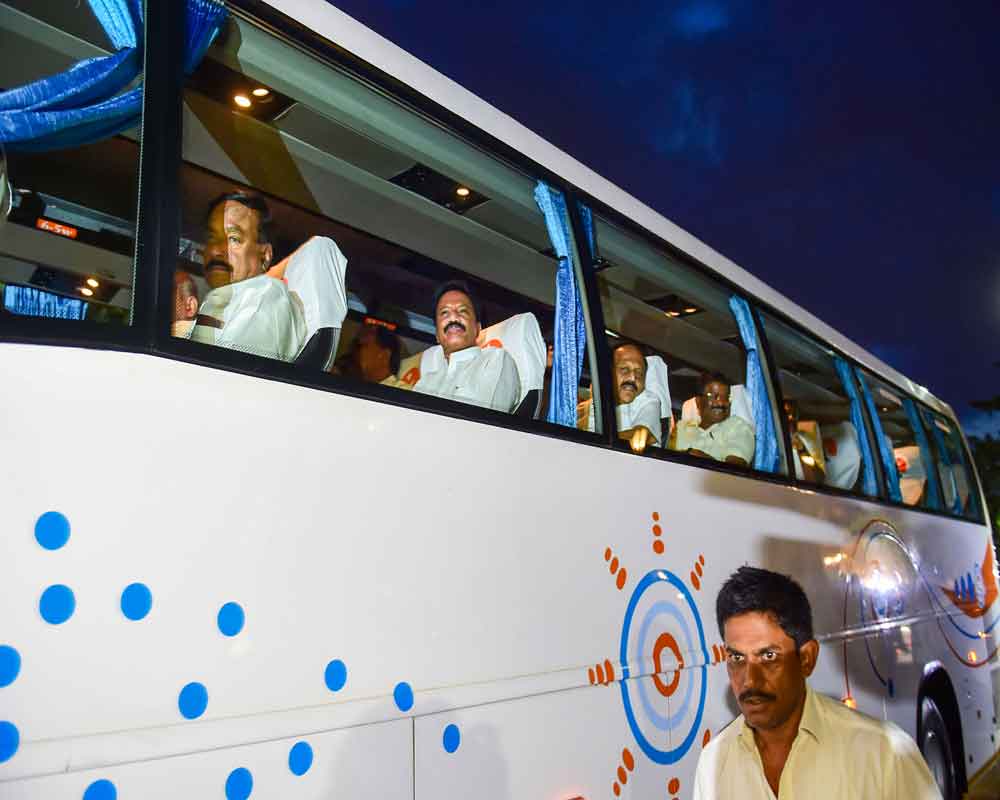 JD(S) MLAs leave a hotel in Bengaluru - PTI
