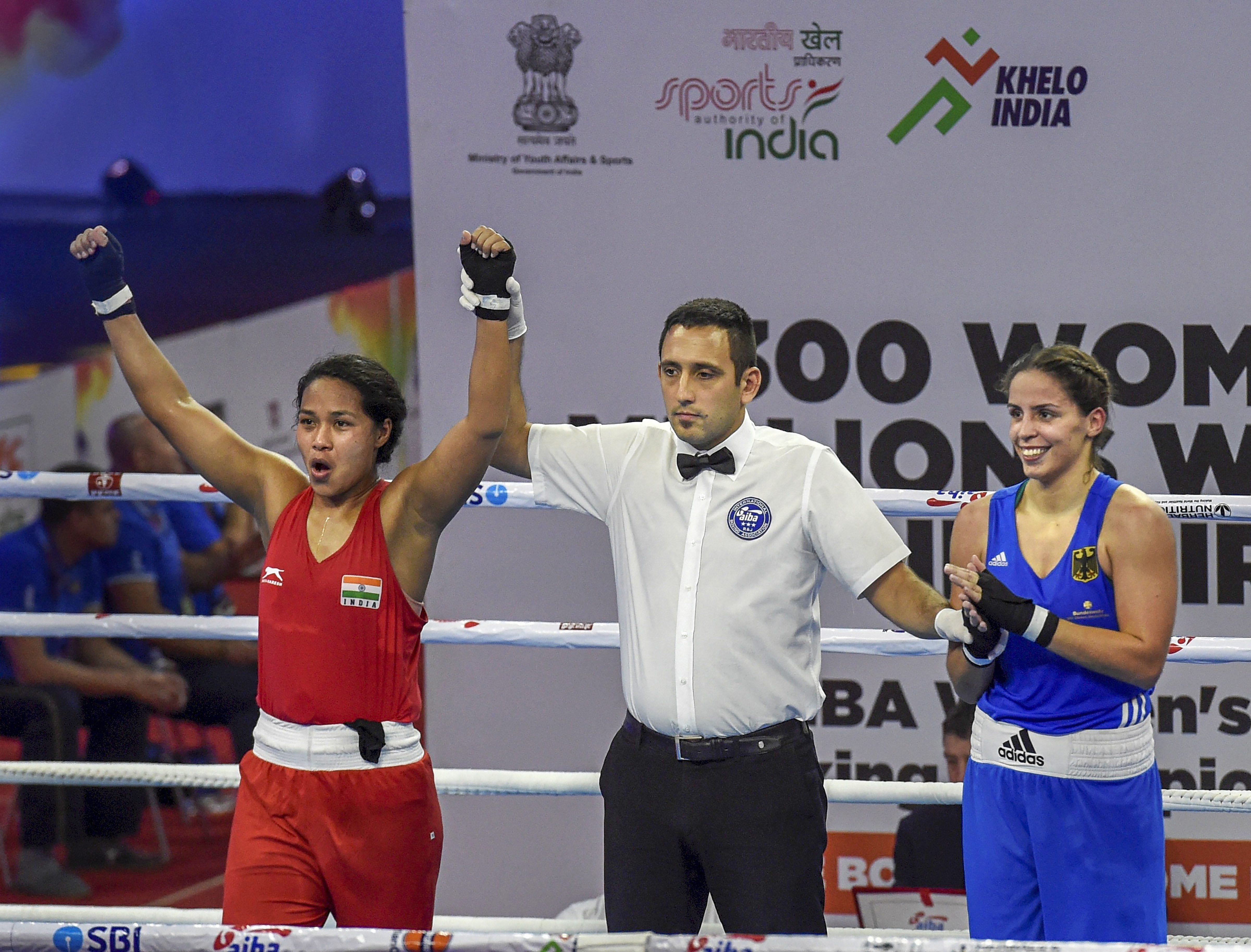 India's Kachari Bhagyabati (Red) being declared winner against Irina-Nicoletta Schonberge of Germany in the women's 81kg category bout at the AIBA Women's World Boxing Championships, in New Delhi - PTI