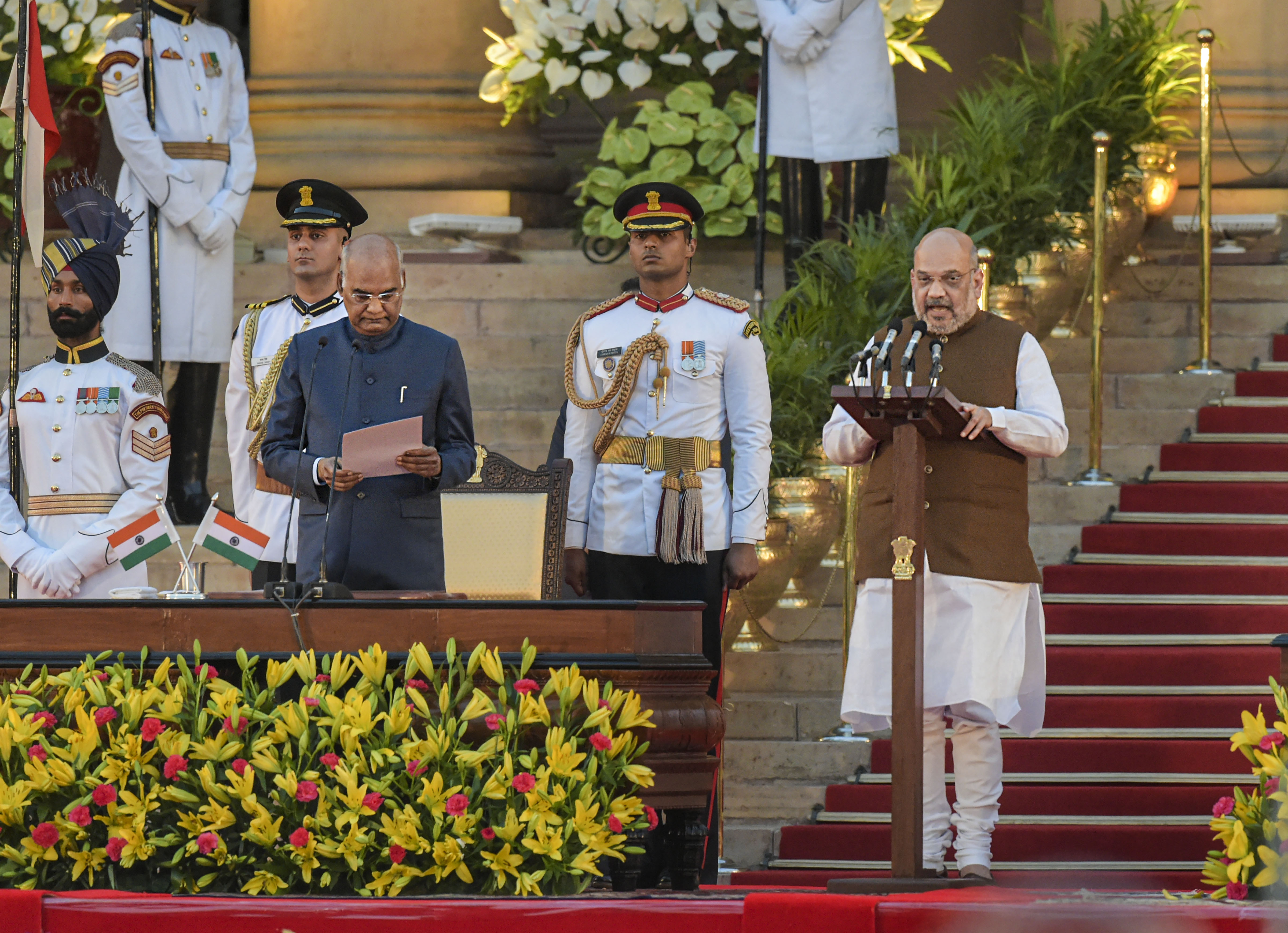 Amit Shah being sworn-in as a Cabinet minister by President Ram Nath Kovind during a ceremony at the forecourt of Rashtrapati Bhawan in New Delhi - PTI