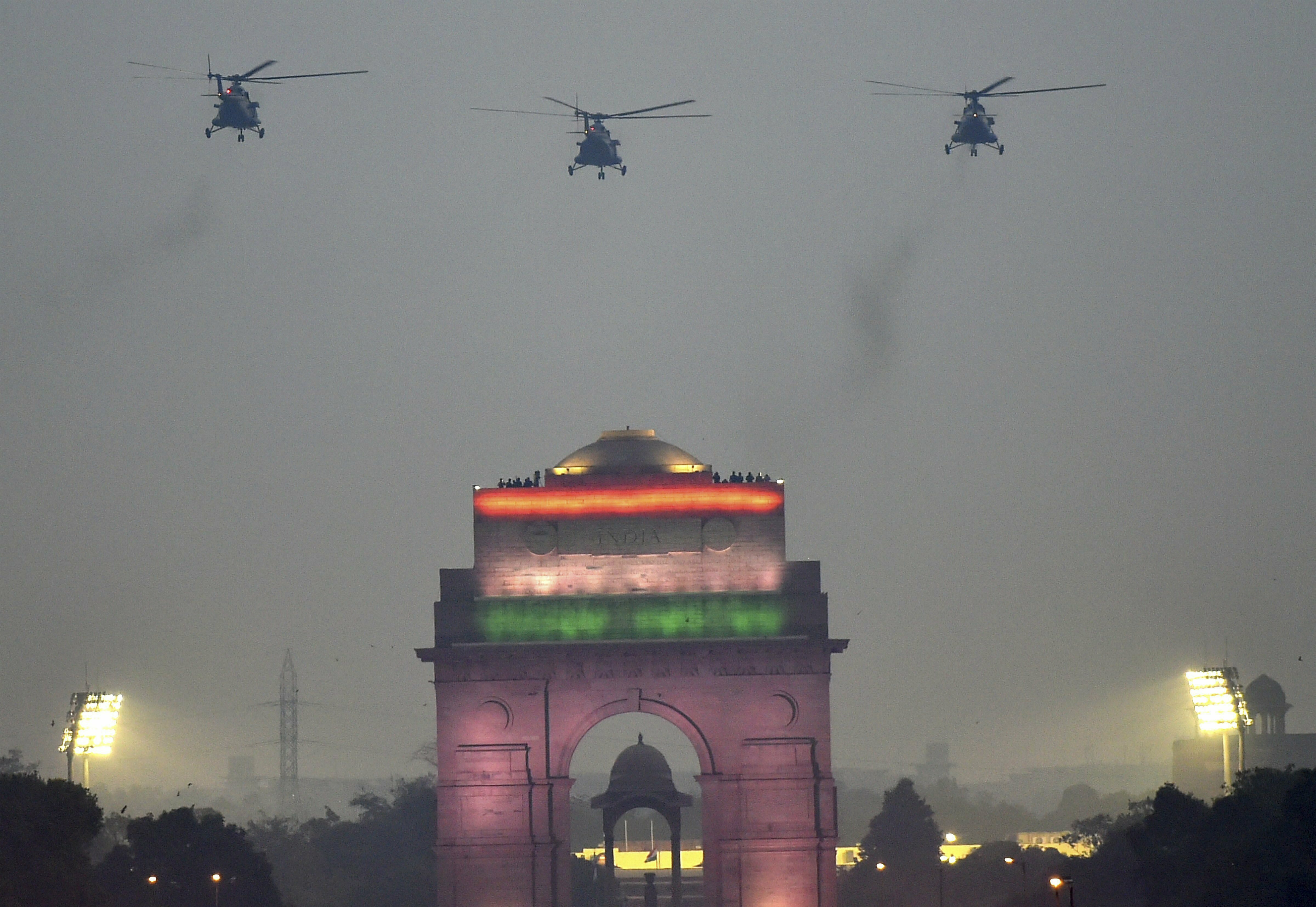 IAF choppers fly-past to shower flower petals on the National War Memorial (NWM) during its inauguration ceremony at India Gate complex in New Delhi - PTI