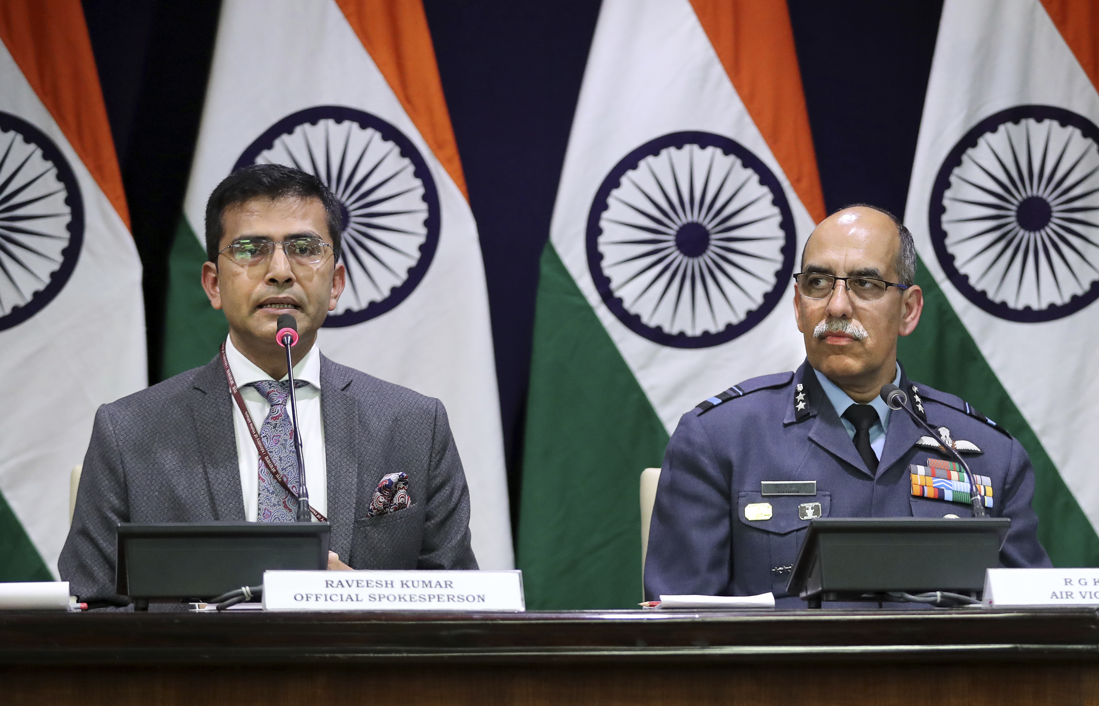 Indian Foreign Ministry spokesperson Raveesh Kumar, left, with Indian Air Force Air Vice Marshal R.G.K. Kapoor gives a statement in New Delhi - AP