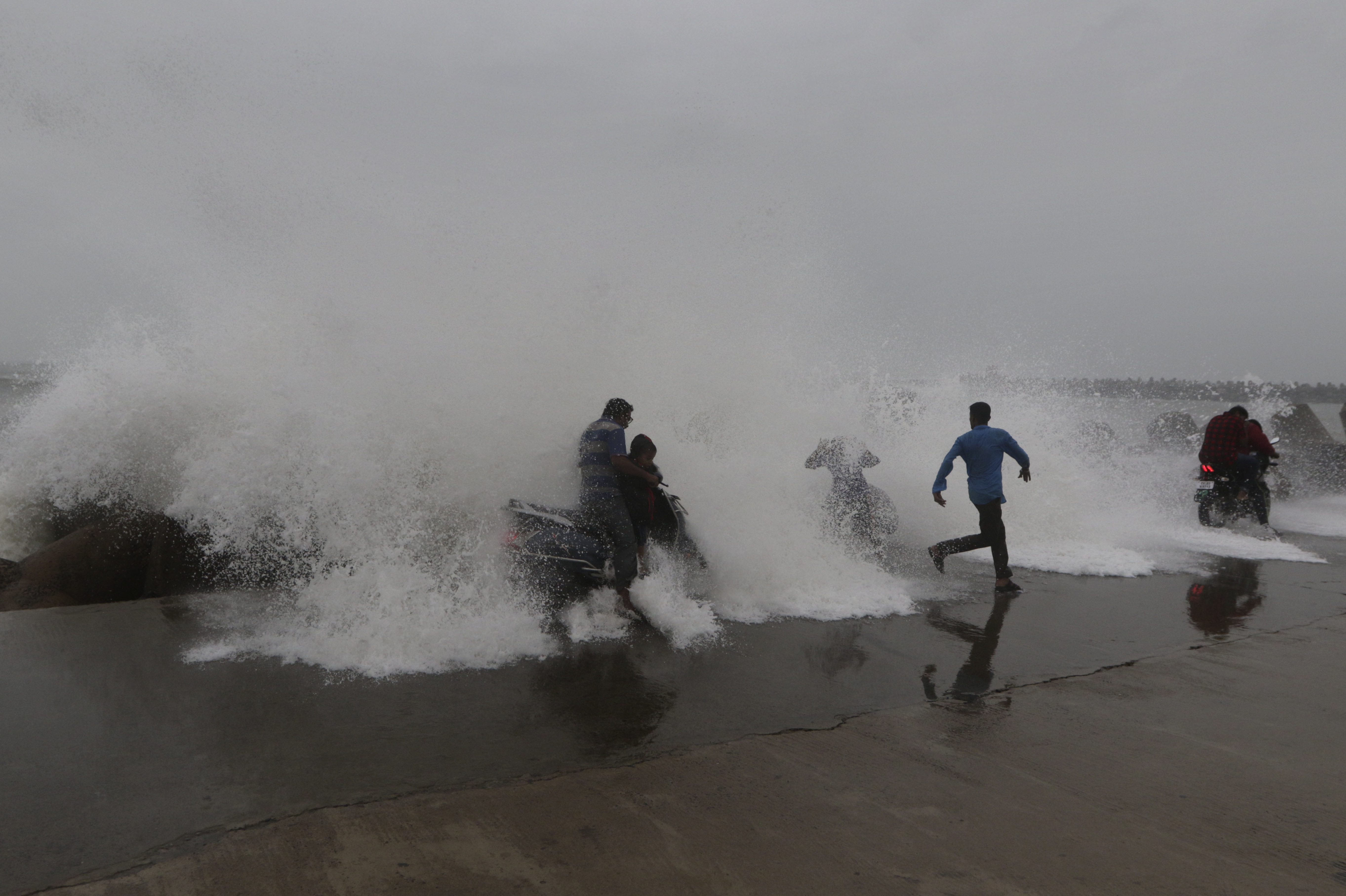 High waves hit the Kasimedu harbor on the Bay of Bengal coast in Chennai, India - AP