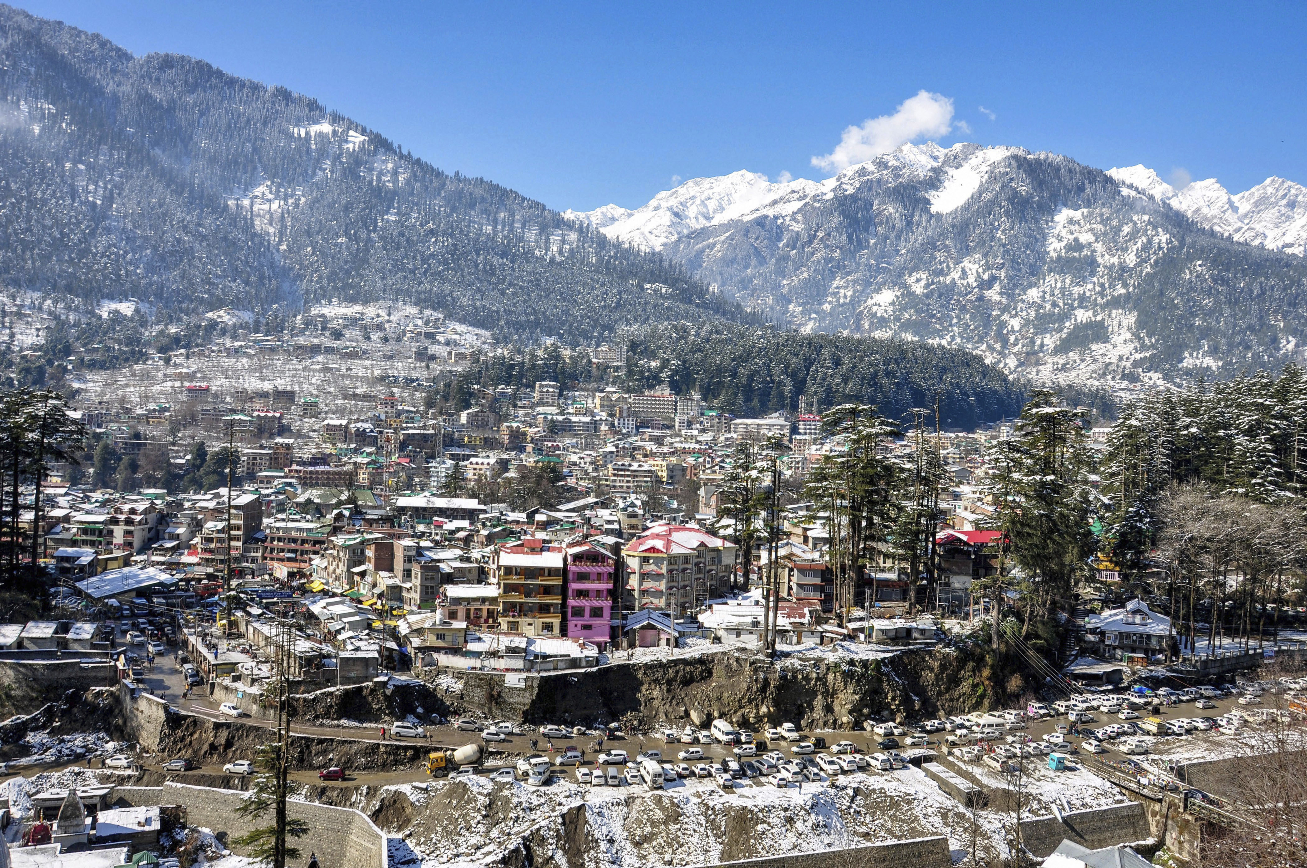 A view of snow-capped mountains following snowfall, in Manali - PTI