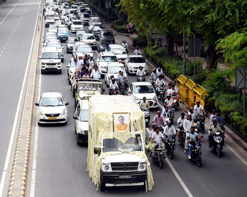 A van carries the mortal remains of former Delhi chief minister Sheila Dikshit towards DPCC office, in New Delhi - PTI