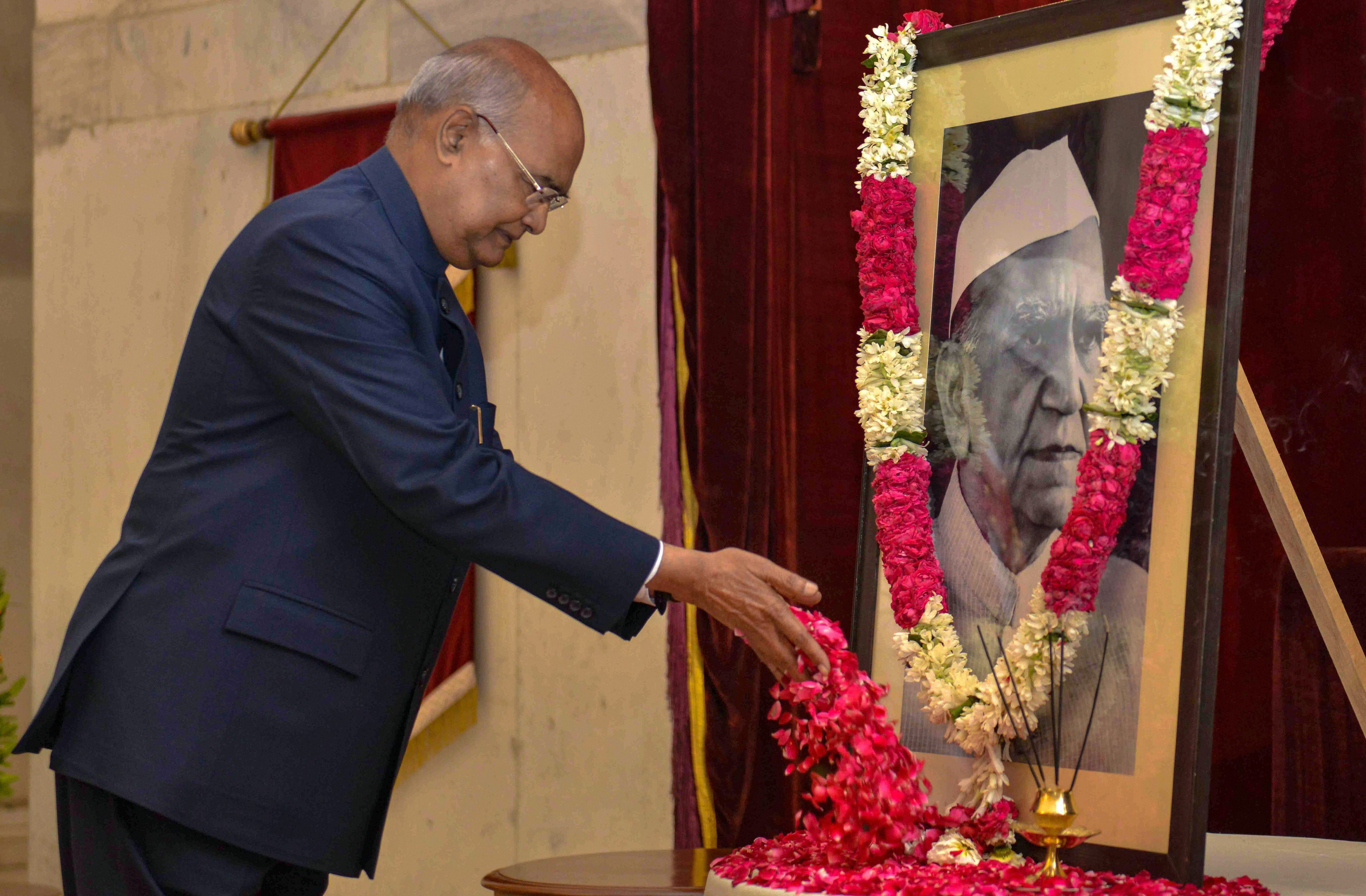 President Ram Nath Kovind pays homage to the former president late Fakhruddin Ali Ahmed on his birth anniversary at Rashtrapati Bhavan, in New Delhi - PTI