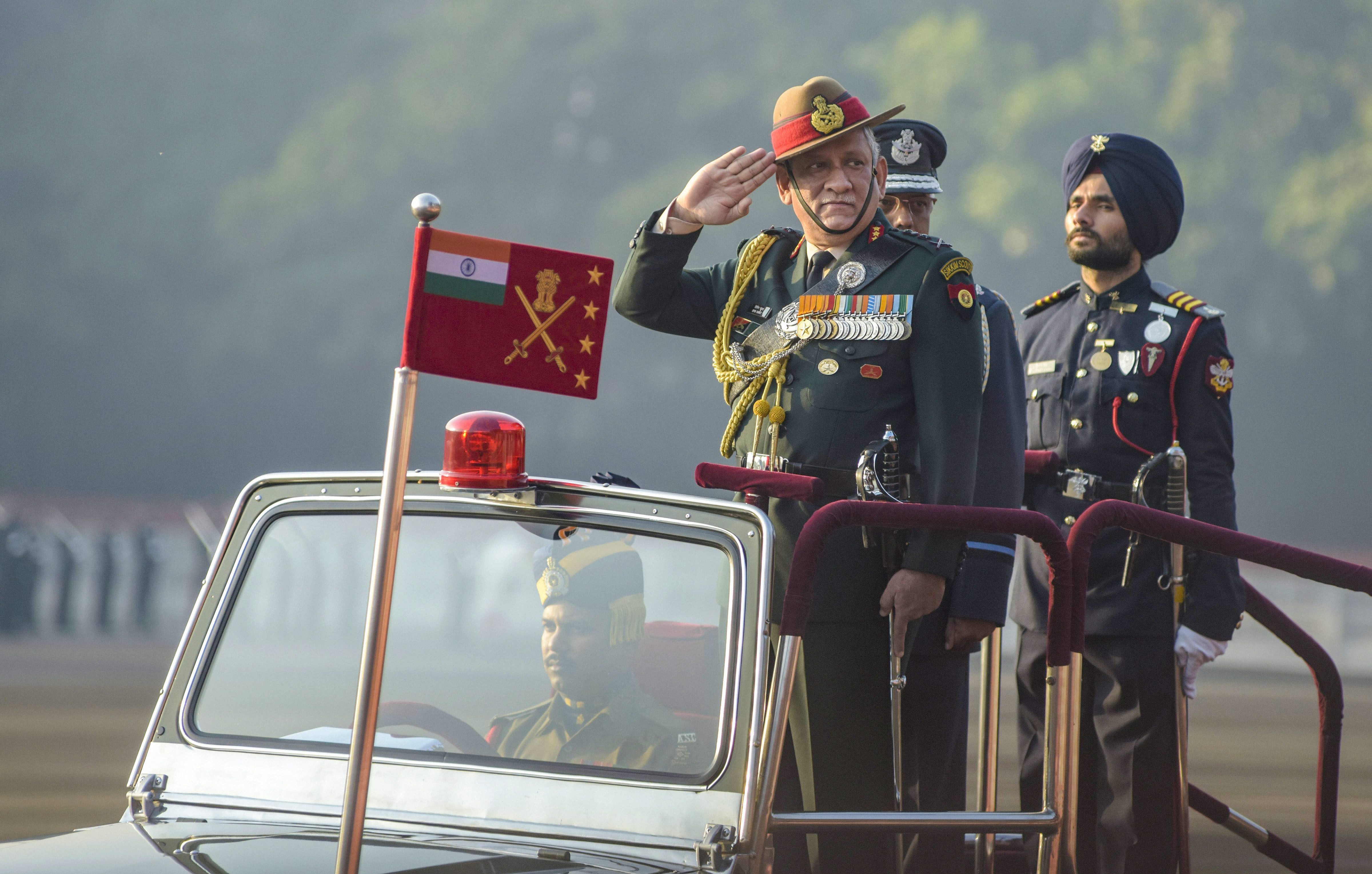 Army Chief Gen. Bipin Rawat reviews during the passing out parade of the 135th course of the National Defence Academy (NDA), in Pune - PTI