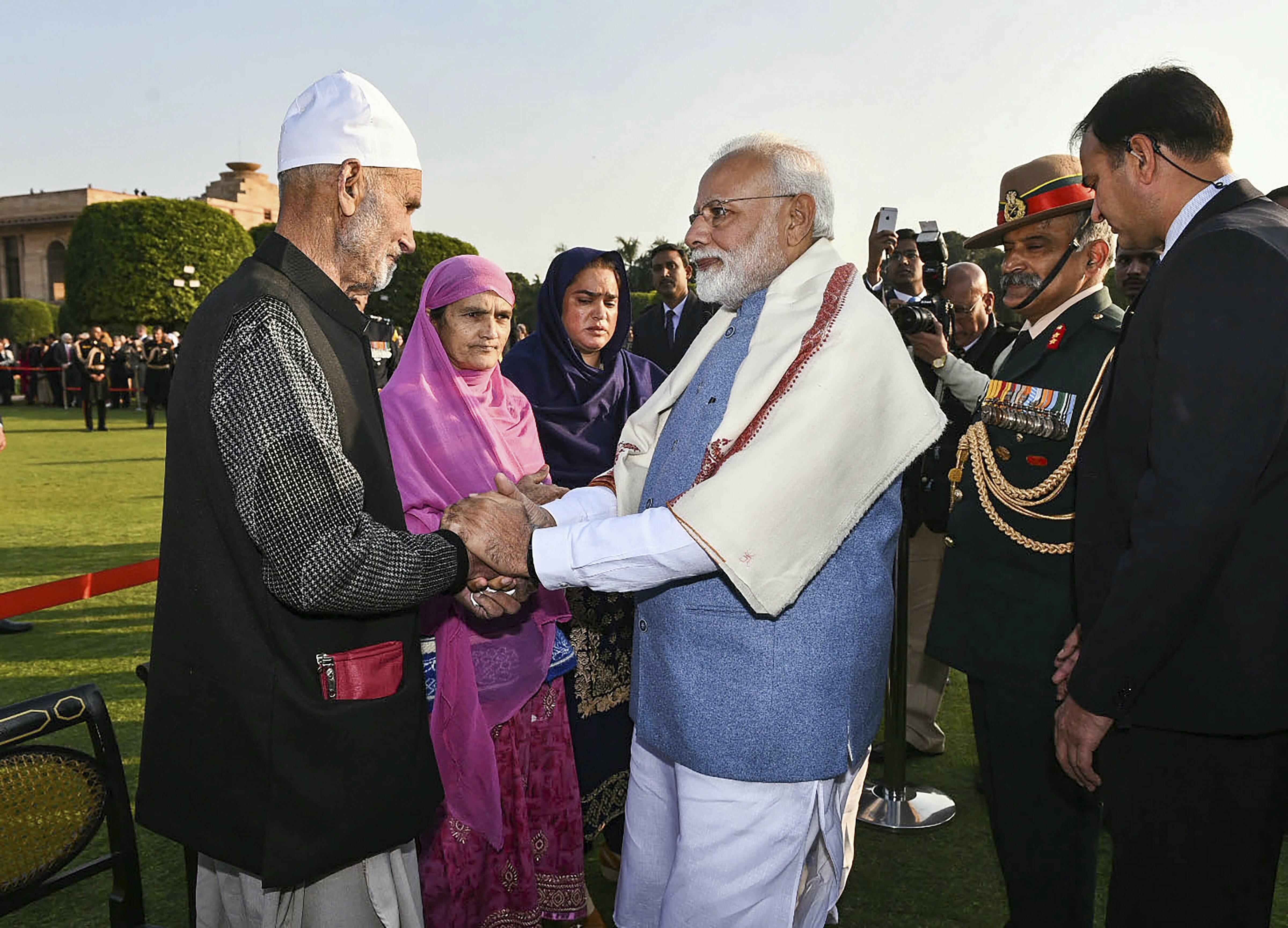 Prime Minister Narendra Modi meets Lance Naik Nazir Ahmad Wani's family members during the Republic Day 'At Home' at Rashtrapati Bhavan in New Delhi - PTI