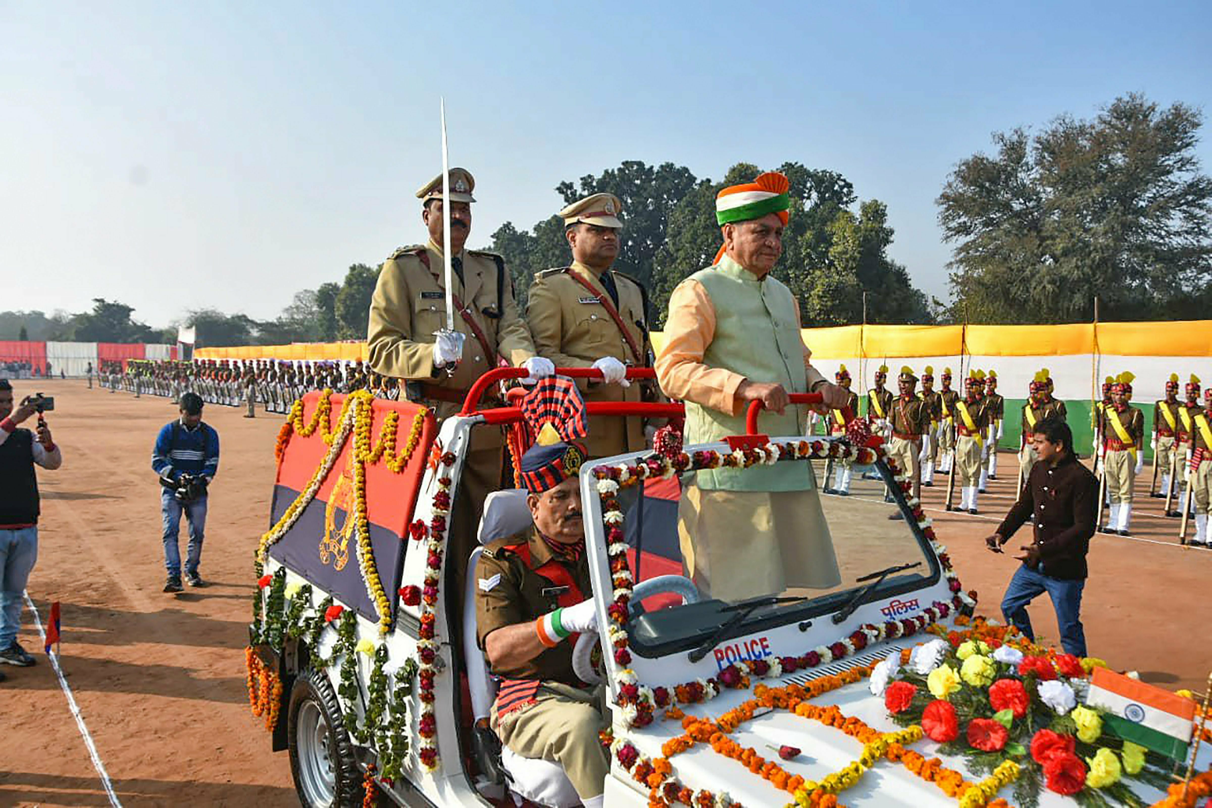 Religious Affairs Minister Laxmi Narayan Chaudhary inspects the guard of honour during the 70th Republic Day celebrations, in Mathura - PTI