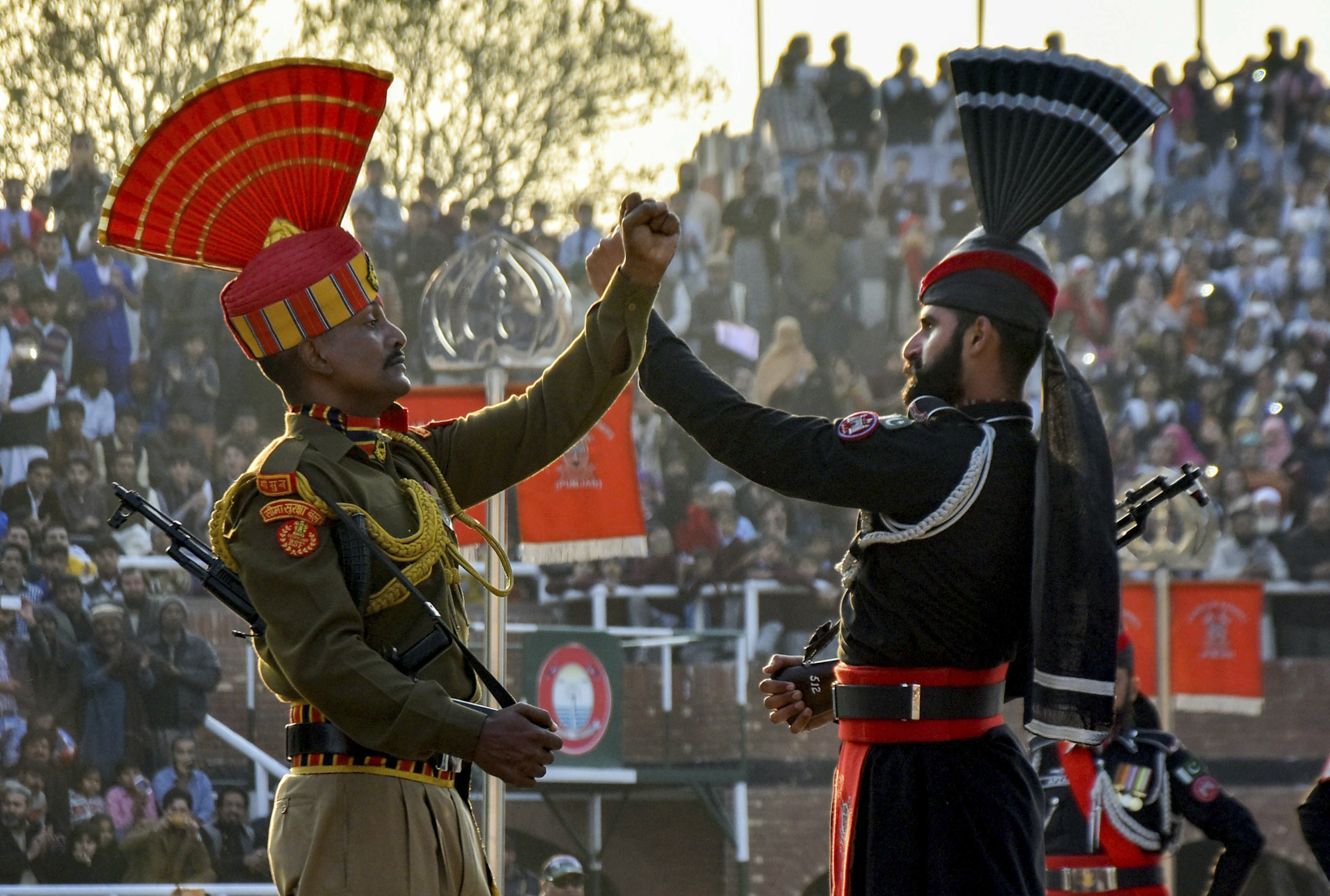 Personnel of Border Security Force (BSF) and Pakistan Rangers perform during the Beating Retreat ceremony on the 70th Republic Day at India-Pakistan Wagah border, at Attari near Amritsar - PTI
