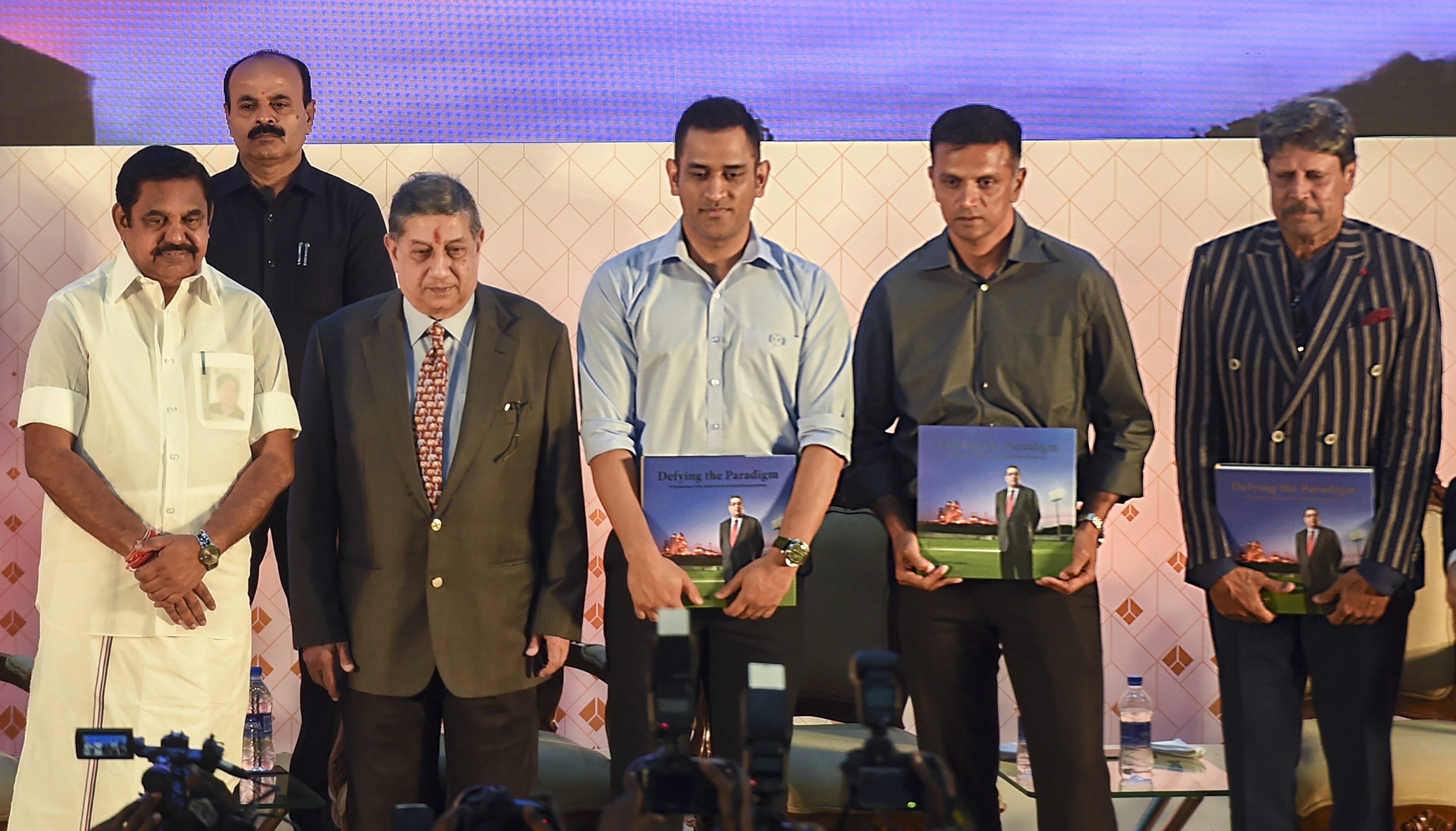 Tamil Nadu Chief Minister K Palaniswami, India Cements Ltd MD N Srinivasan, cricketers MS Dhoni, Rahul dravid, Kapil Dev during the launch of a coffee table book on the journey of India Cements Ltd. and 50 years of company's association with Srinivasan, in Chennai - PTI