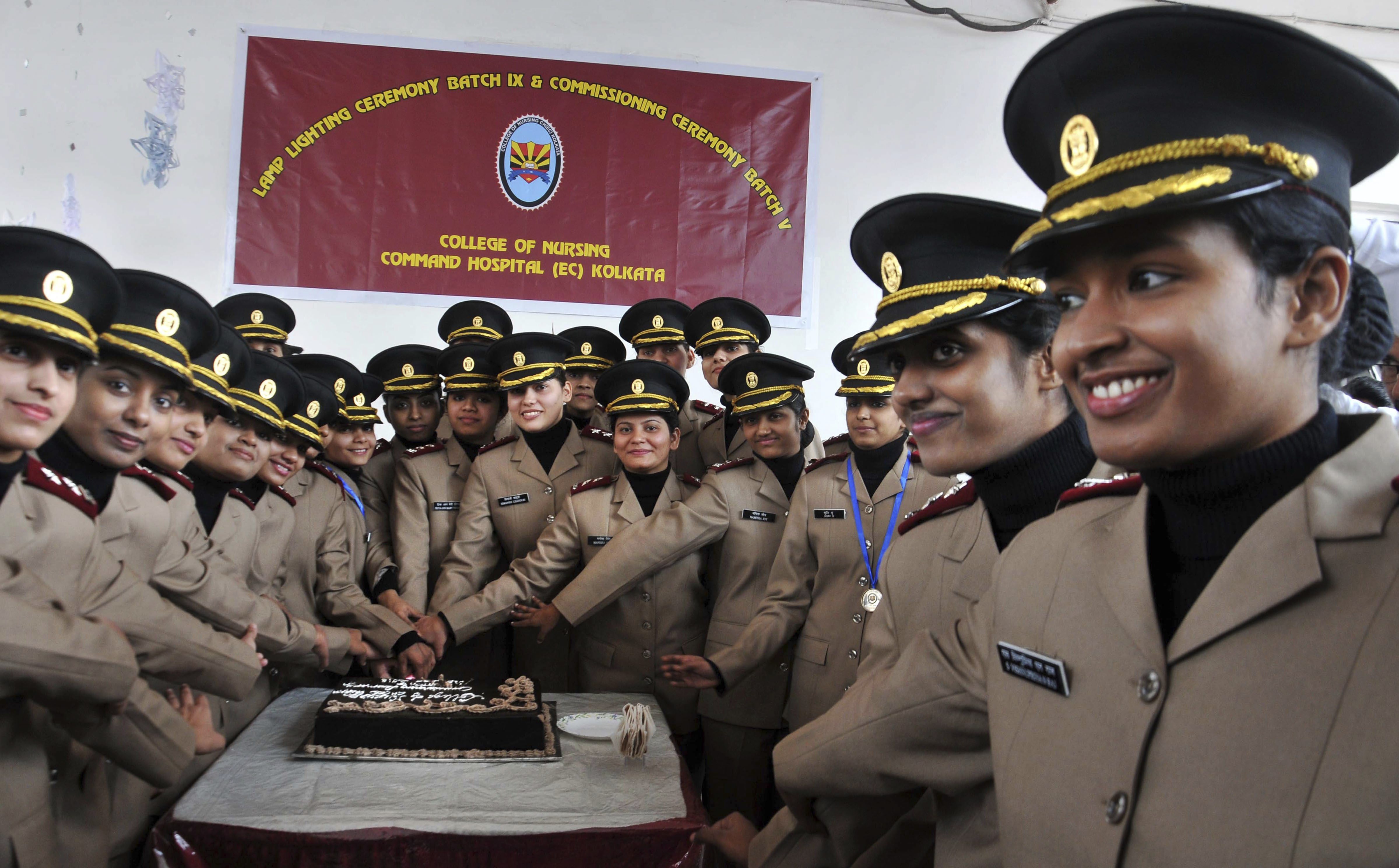 Military Nursing cadets celebrate after their Commissioning ceremony, at Command Hospital (Eastern Command), in Kolkata - PTI