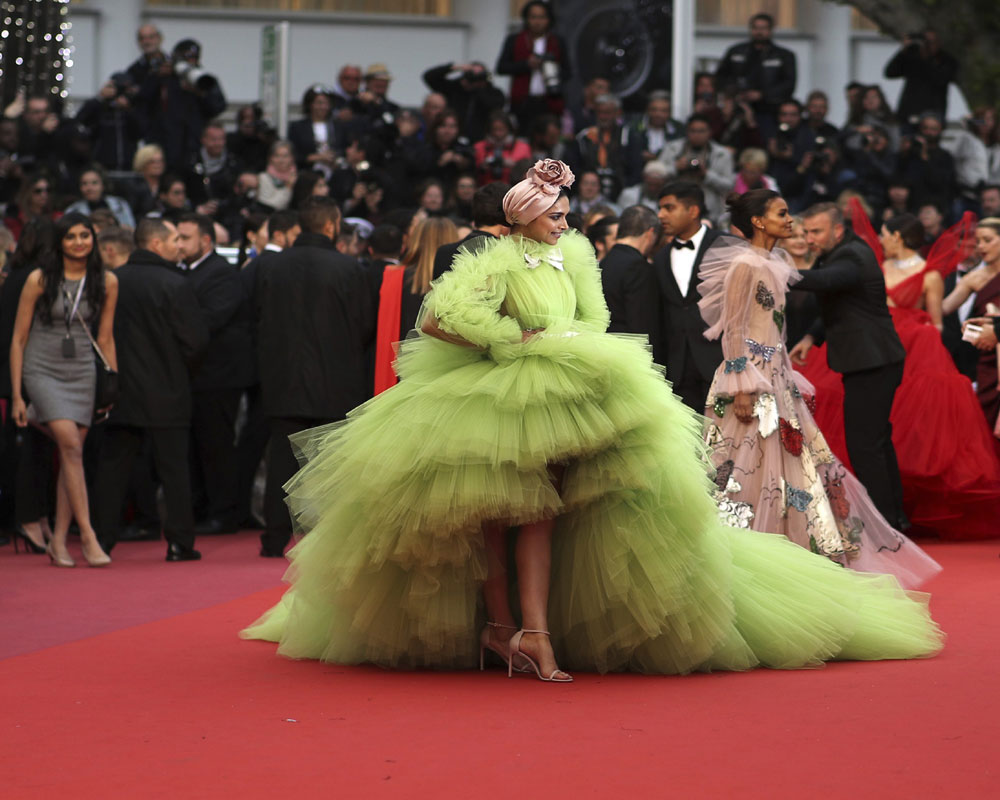 Actress Deepika Padukon poses for photographers upon arrival at the premiere of the film 'Pain and Glory' at the 72nd international film festival, Cannes, southern France - PTI