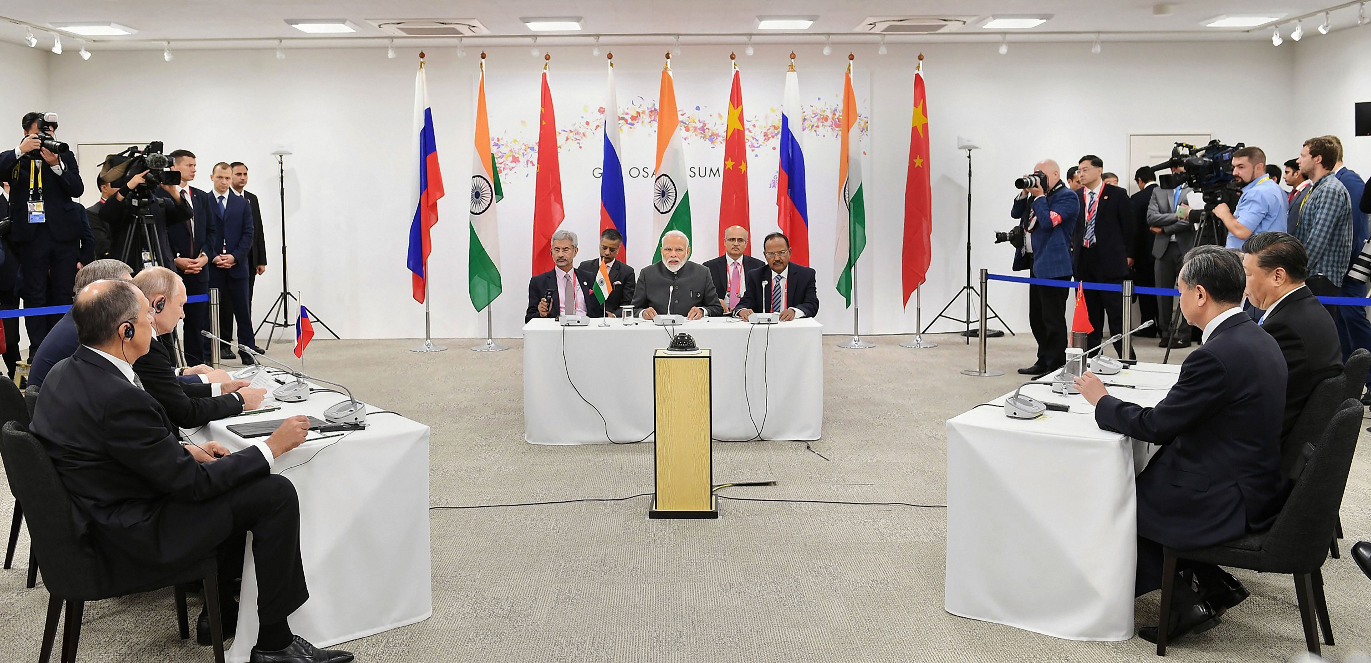Prime Minister Narendra Modi at an informal meeting between Russia, India and China (RIC), on the sidelines of the G-20 Summit, in Osaka, Japan - PTI