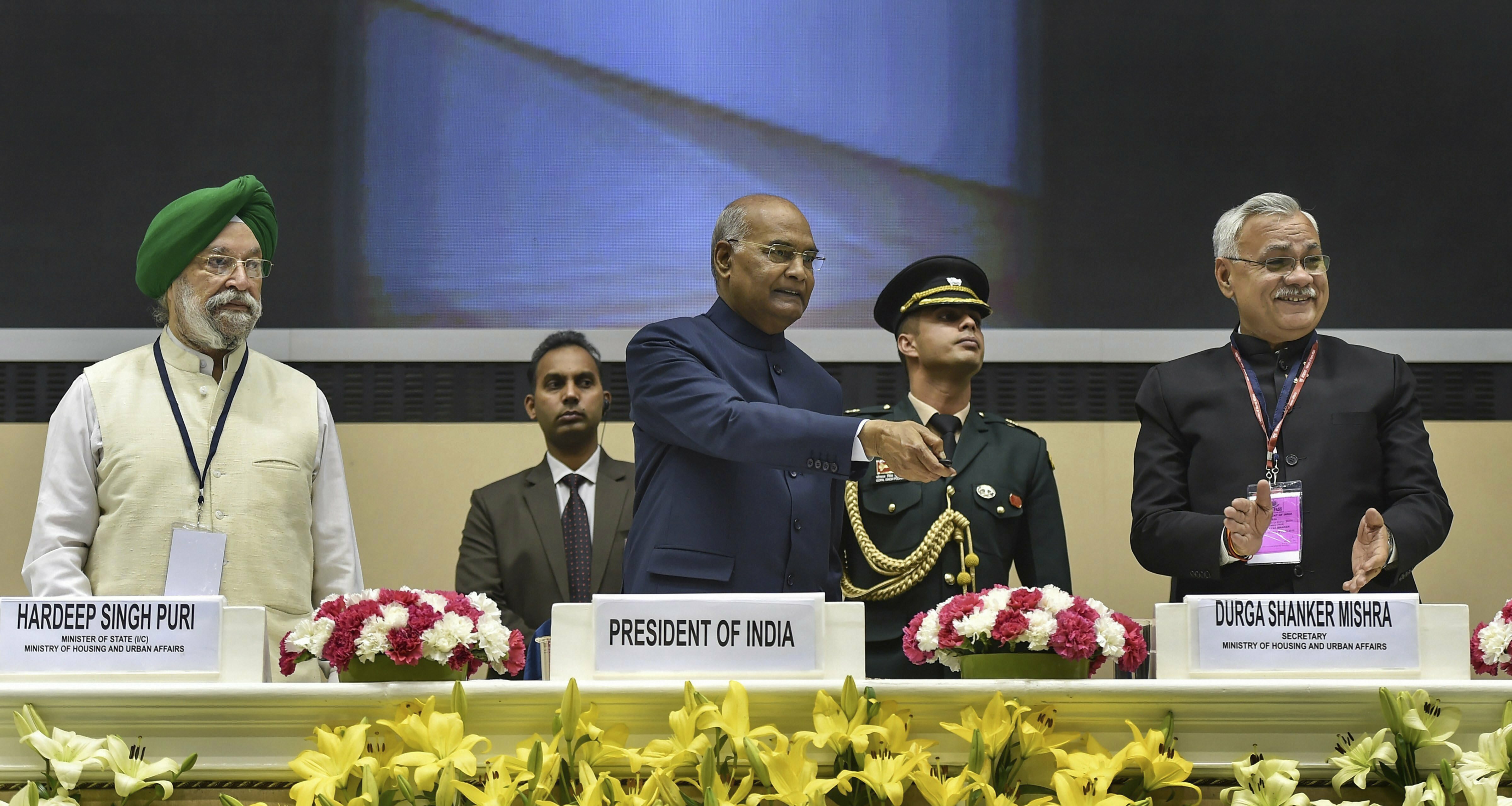 President Ram Nath Kovind with Minister of State for Housing and Urban Development HS Puri during the Swachh Survekshan Awards 2019 function in New Delhi - AP
