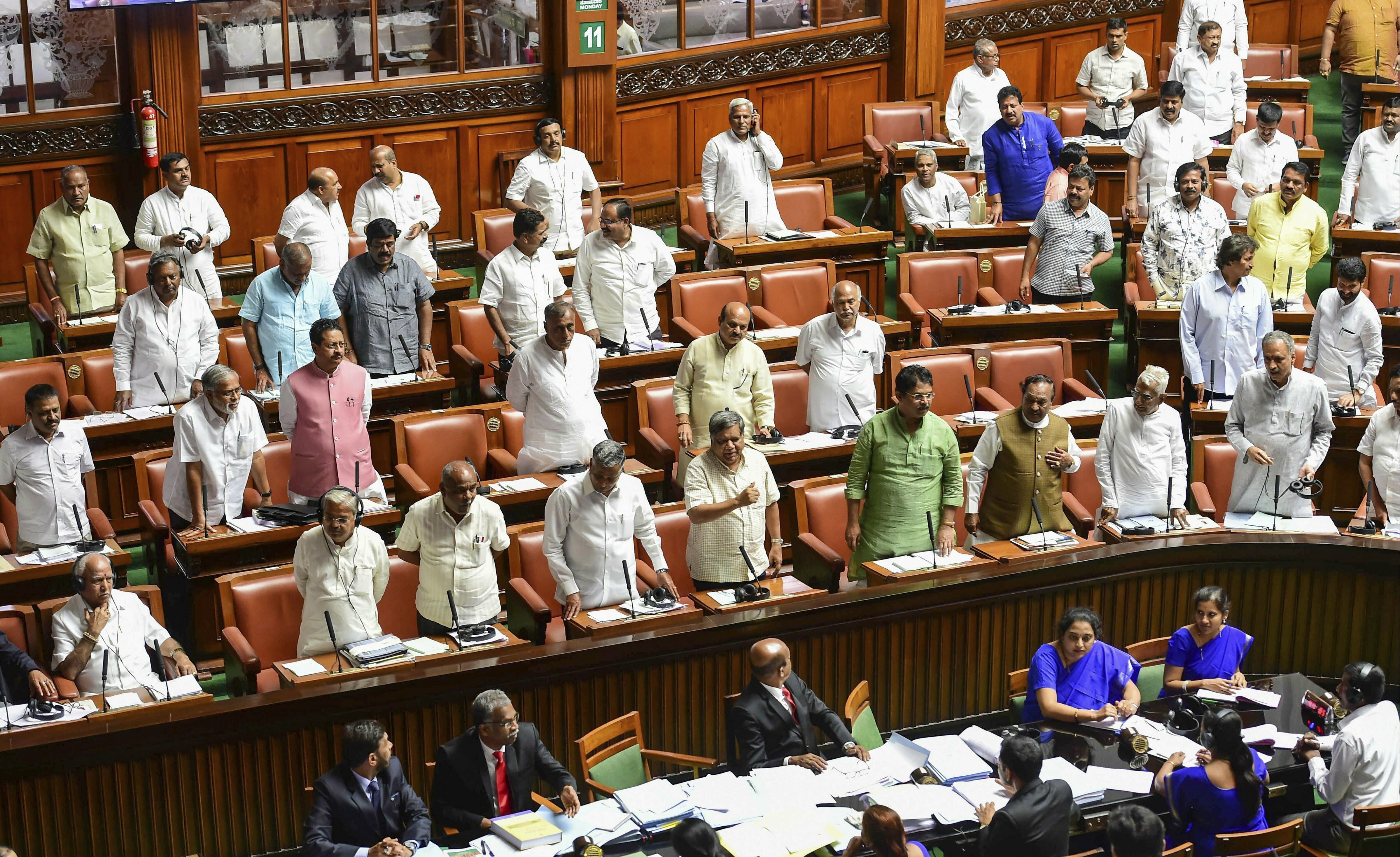 BJP Karnataka chief BS Yeddyurappa with his party MLA's disrupt the proceedings during the budget session at Vidhana Soudha, in Bengaluru - PTI