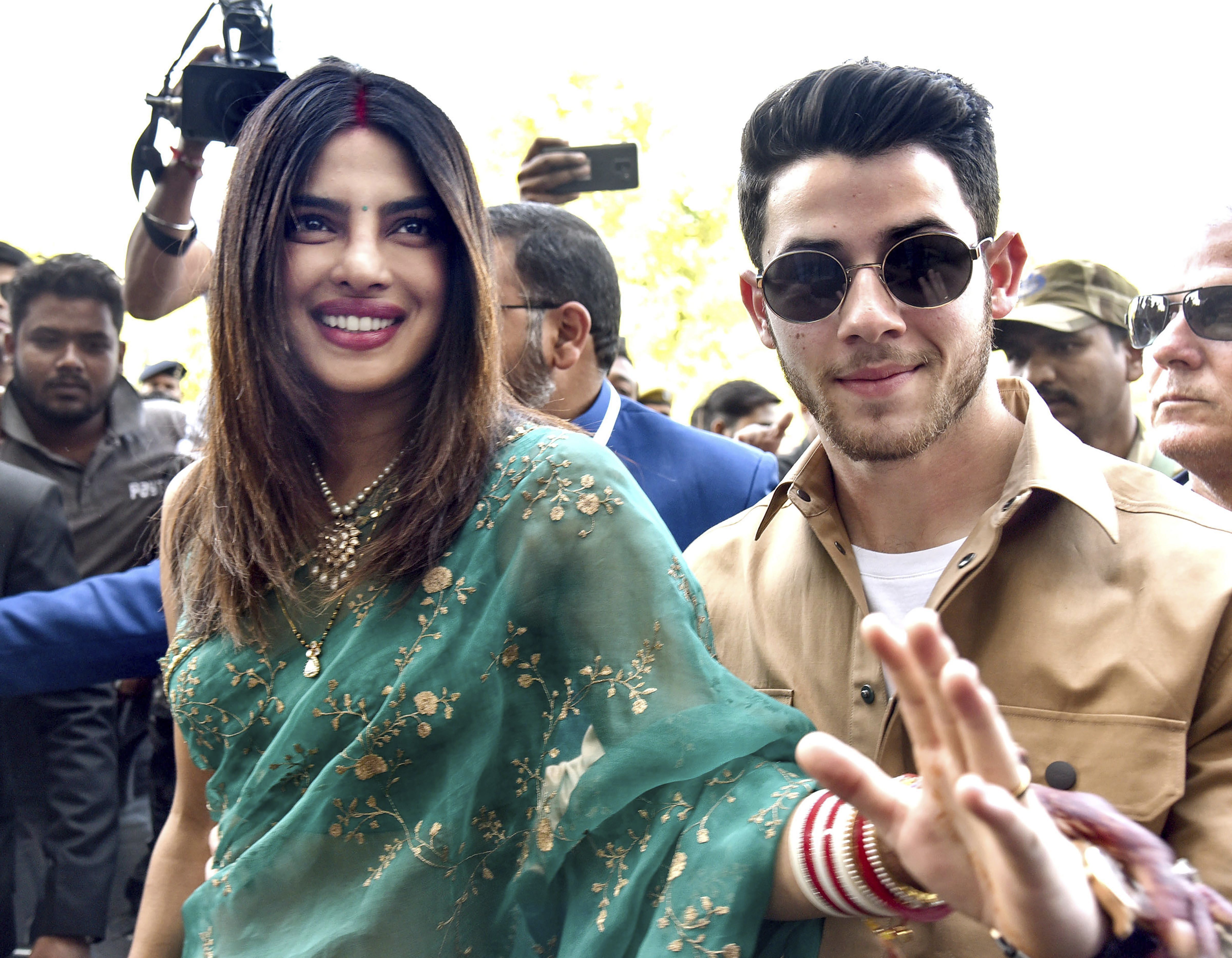 Actress Priyanka Chopra and Nick Jonas prepare to depart for Mumbai after their wedding ceremony in Jodhpur - PTI