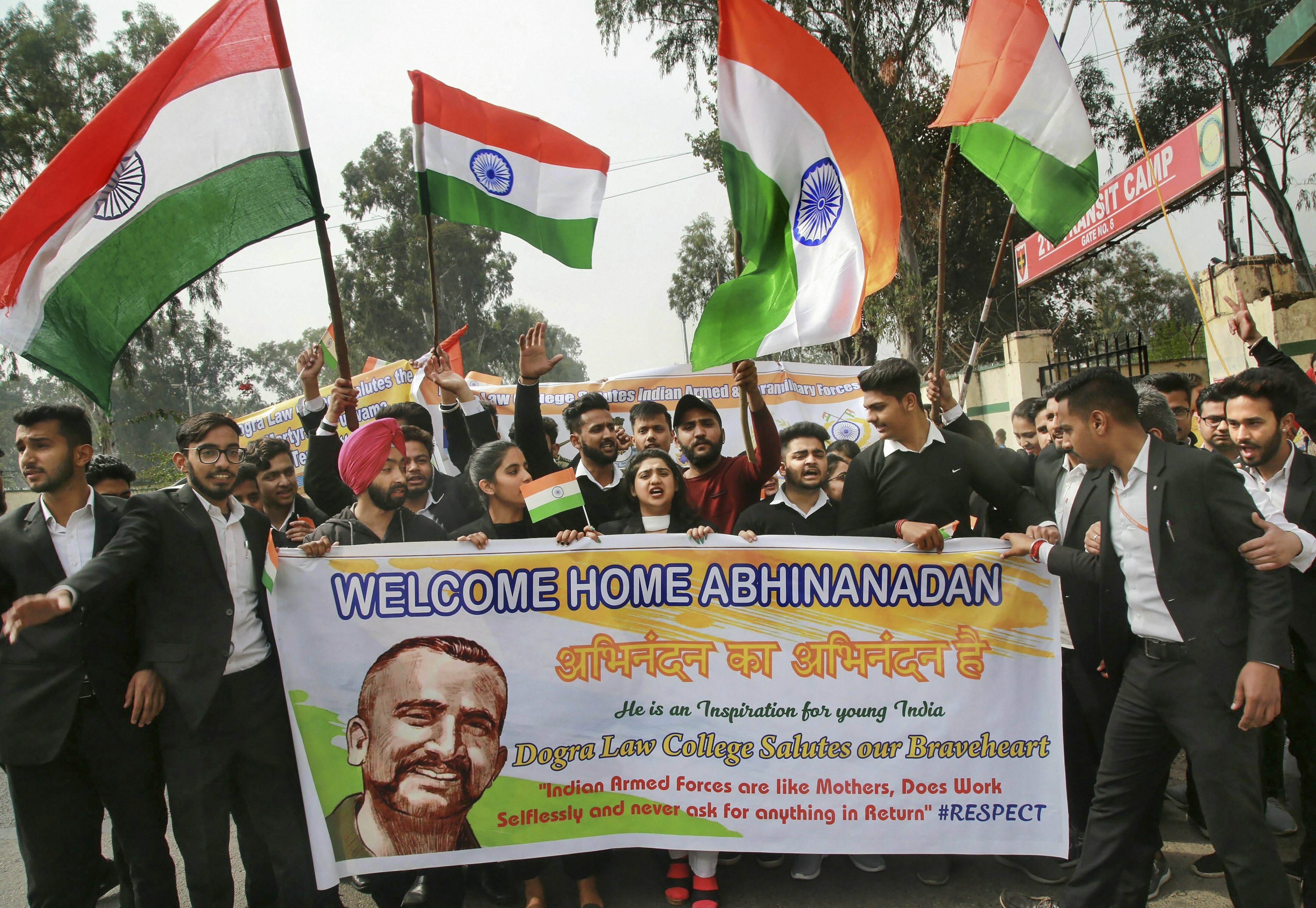Students cheer at a rally as they welcome the IAF Wing Commander Abhinandan Varthaman, who was captured by Pakistan during an aerial combat, in Jammu - PTI
